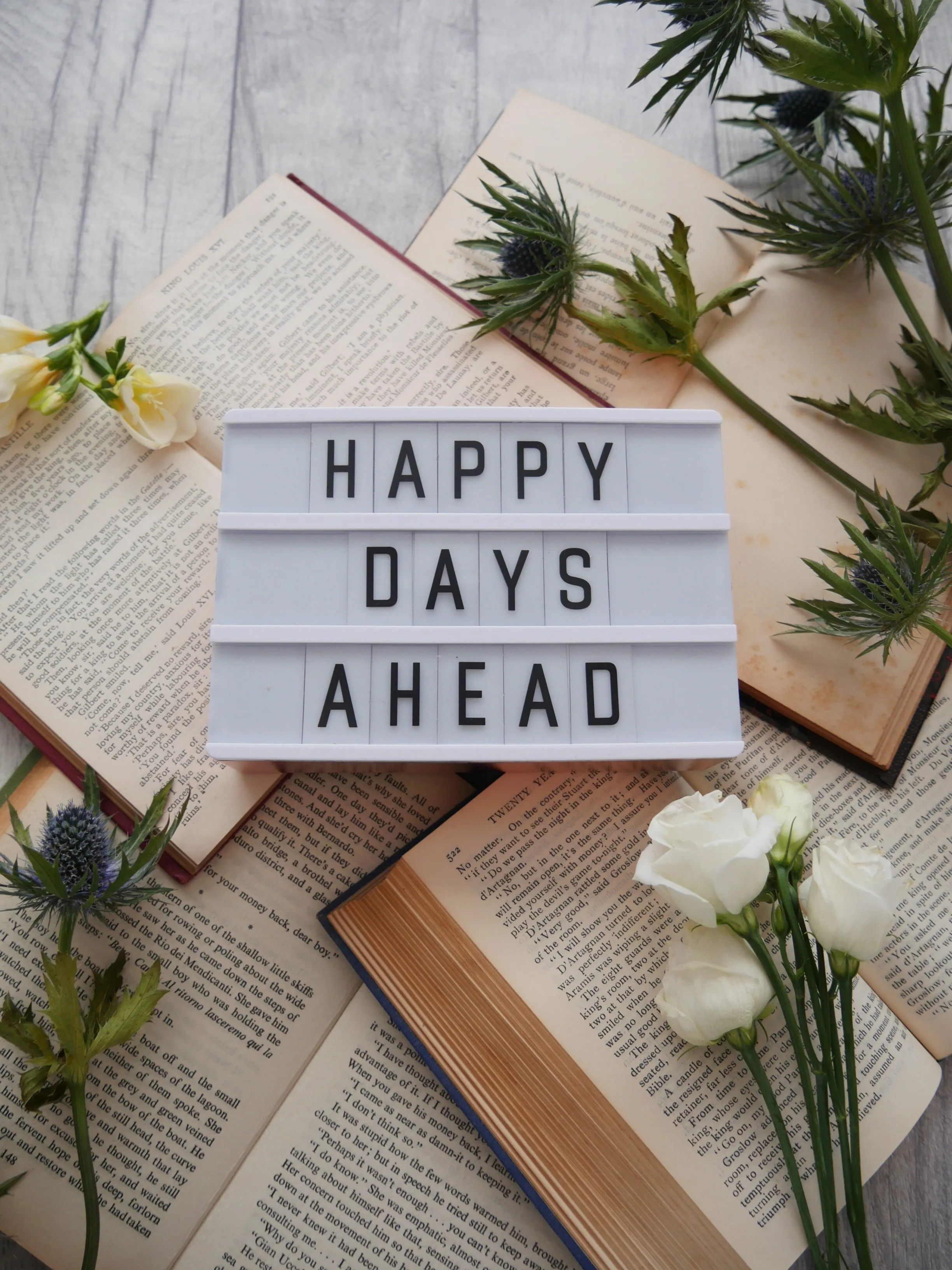 Happy Days Ahead Quote with Flowers and Notebook Wallpaper