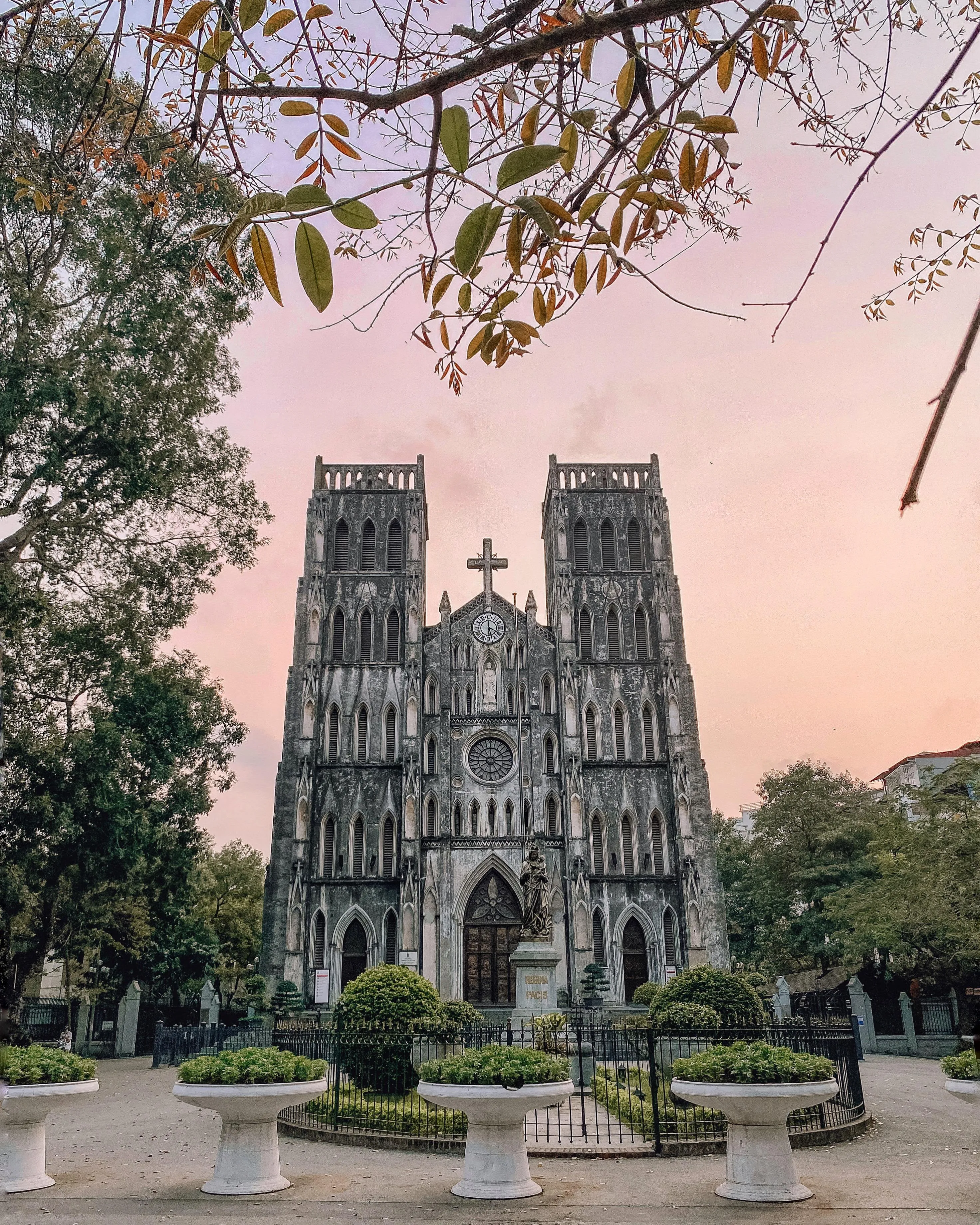 Historic Gothic Cathedral Surrounded by Spring Trees