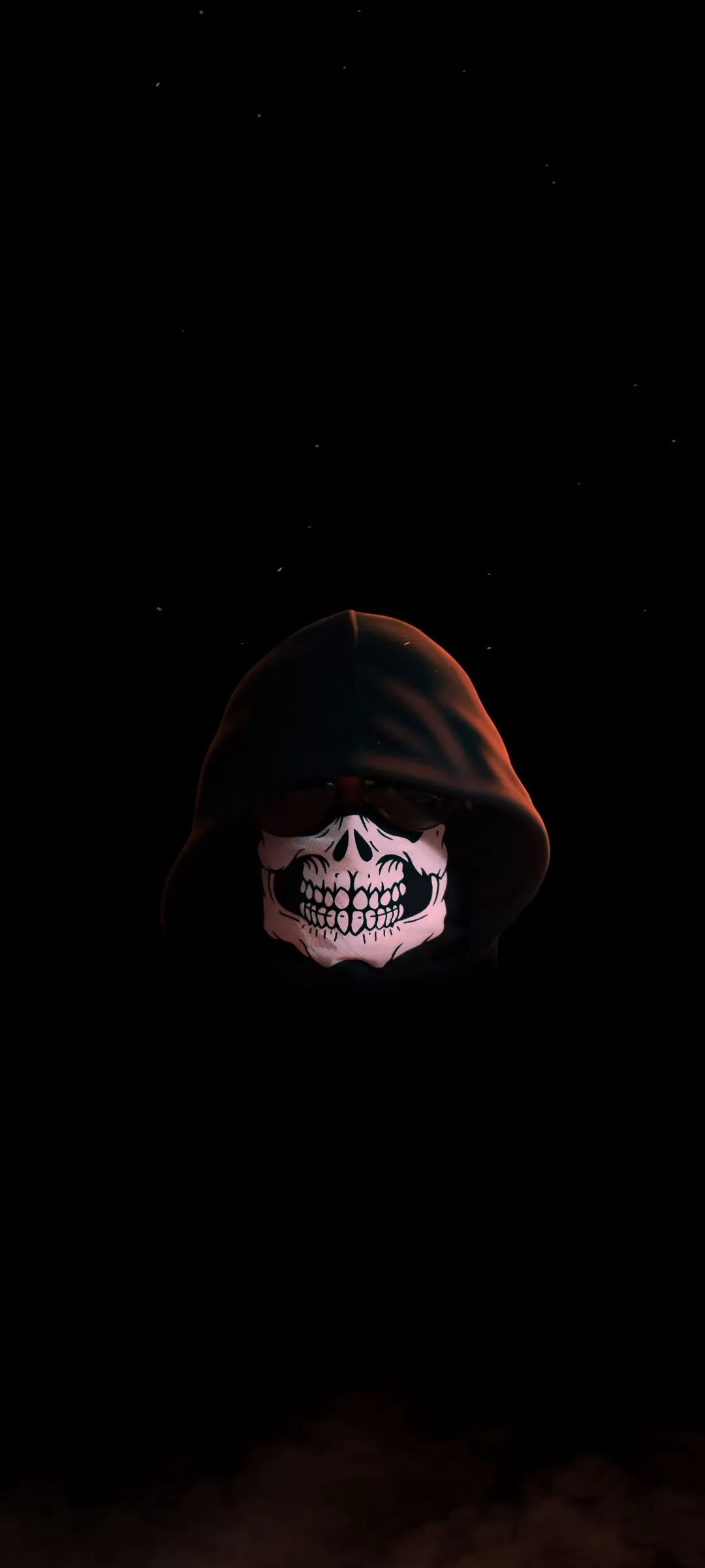 Hooded Figure Standing Alone in Dark Mysterious Light