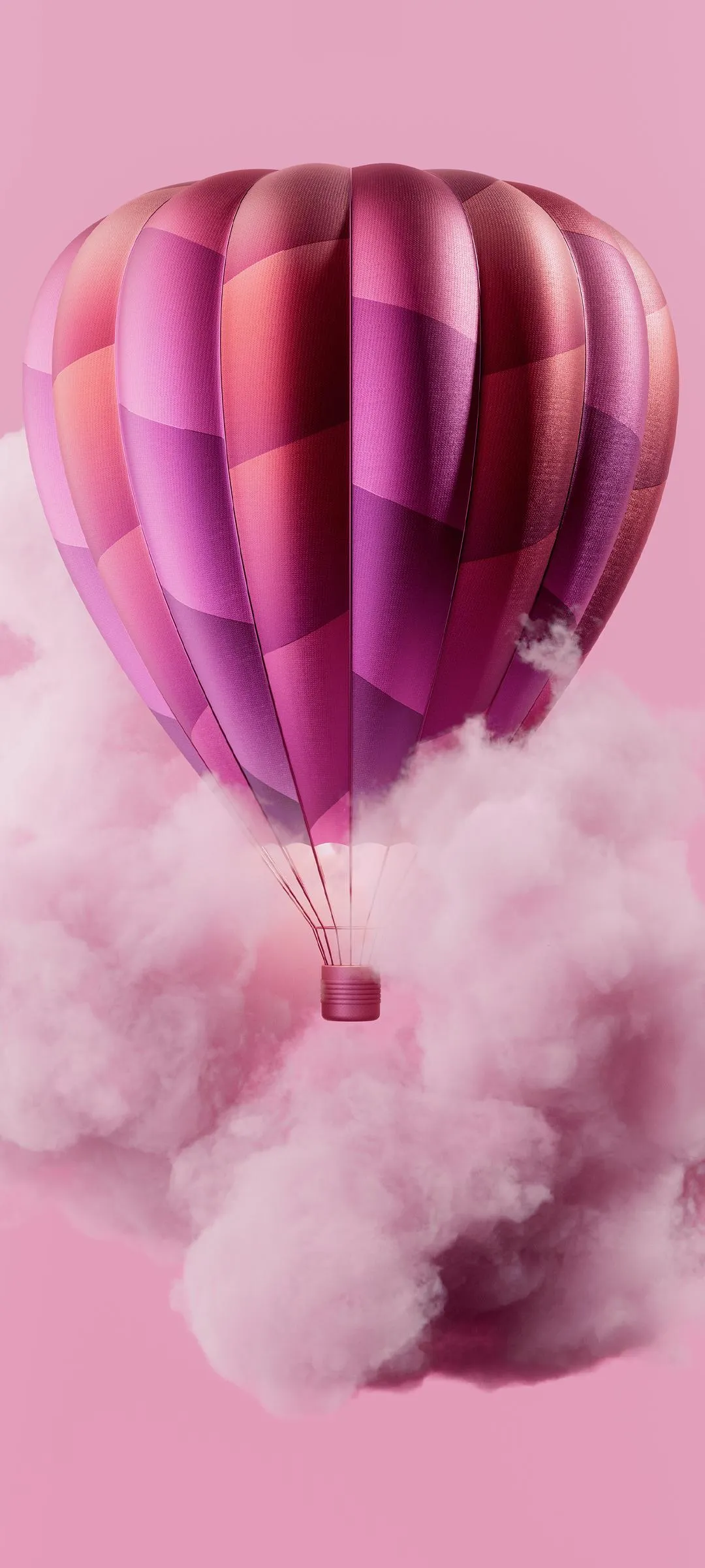 Hot Air Balloon Floating in Pink Cloudy Sky Wallpaper