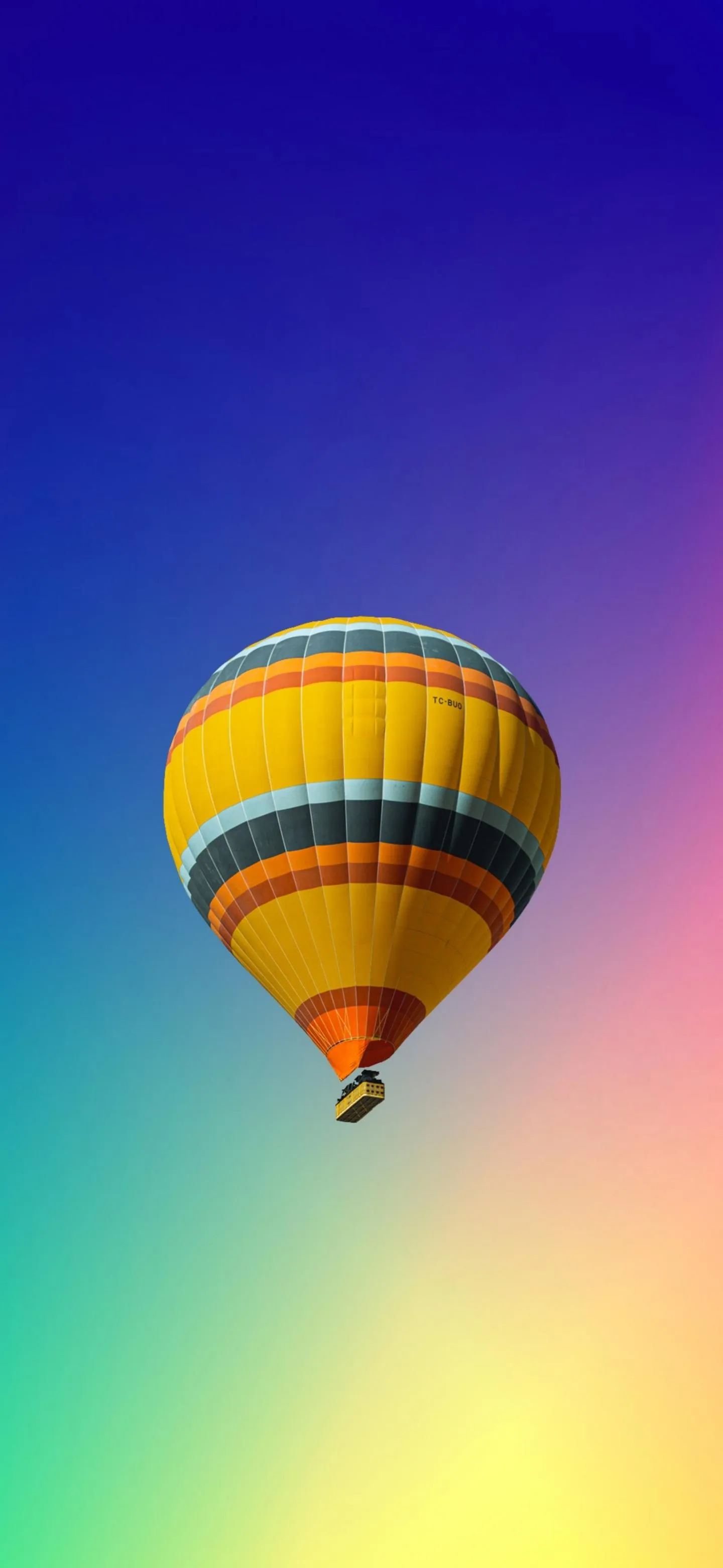 Hot Air Balloon Floating Over Sunset Horizon Wallpaper