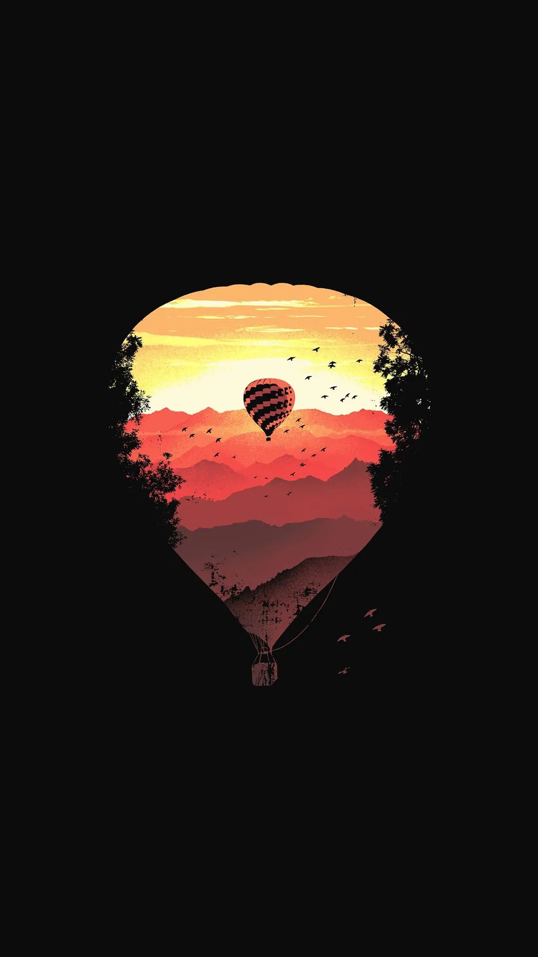 Hot Air Balloon Over Mountains at Glowing Sunset Wallpaper