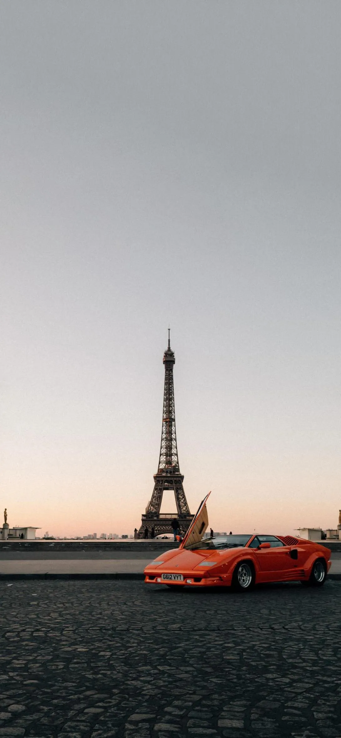 Iconic Lamborghini at Eiffel Tower Parisian Elegance