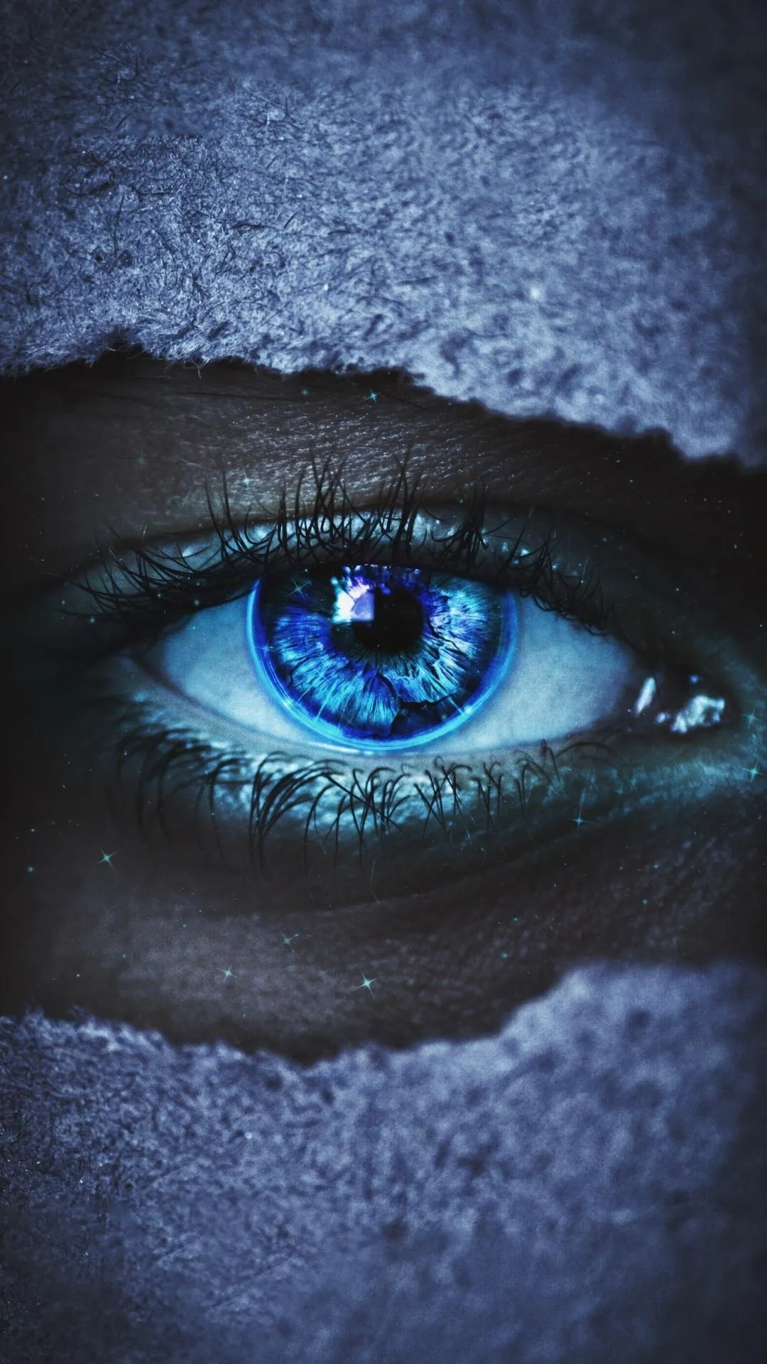Intense Blue Eye Close Up with Cracked Surface Background
