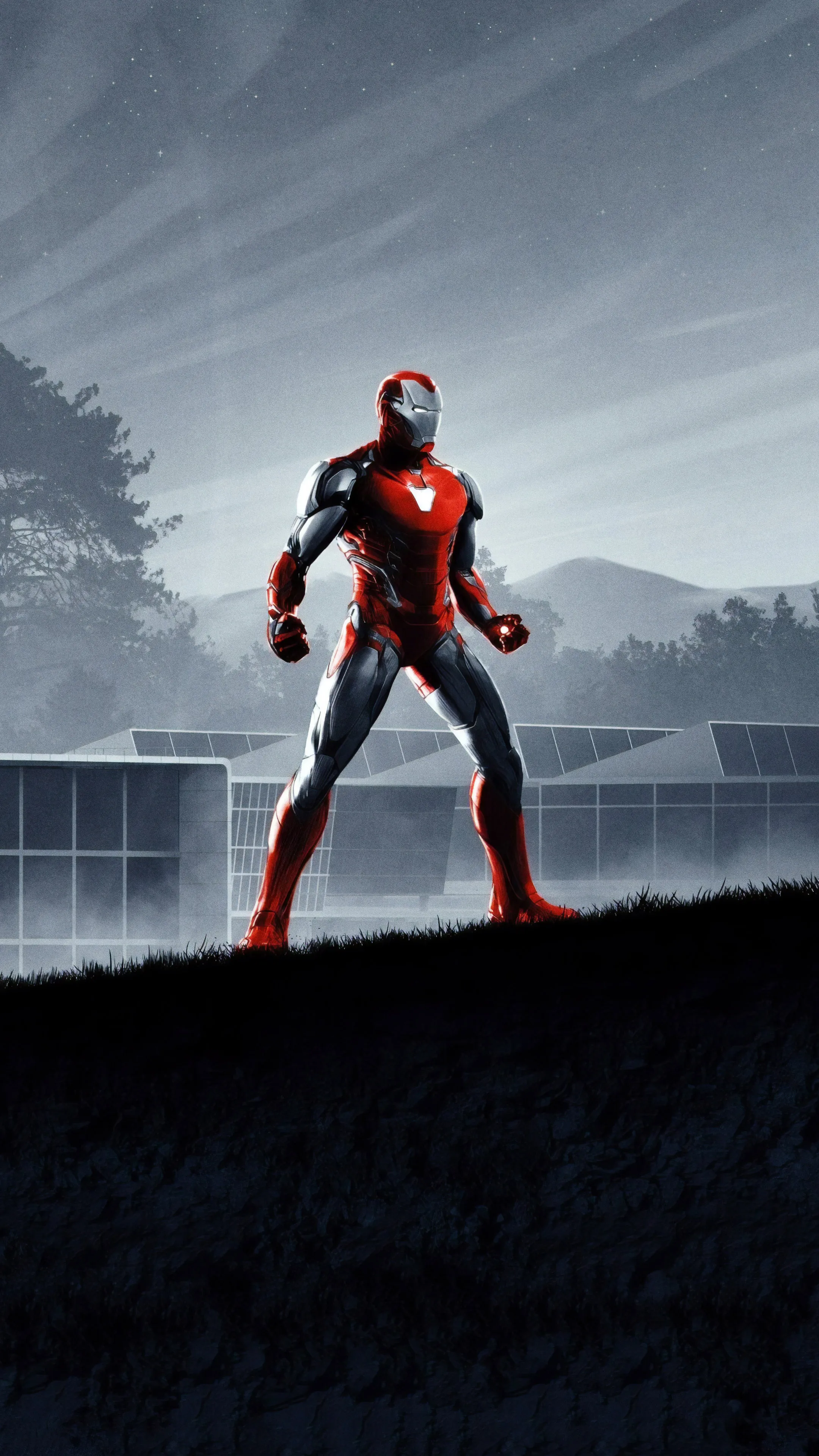 Iron Man Standing Heroically in Foggy Urban Landscape