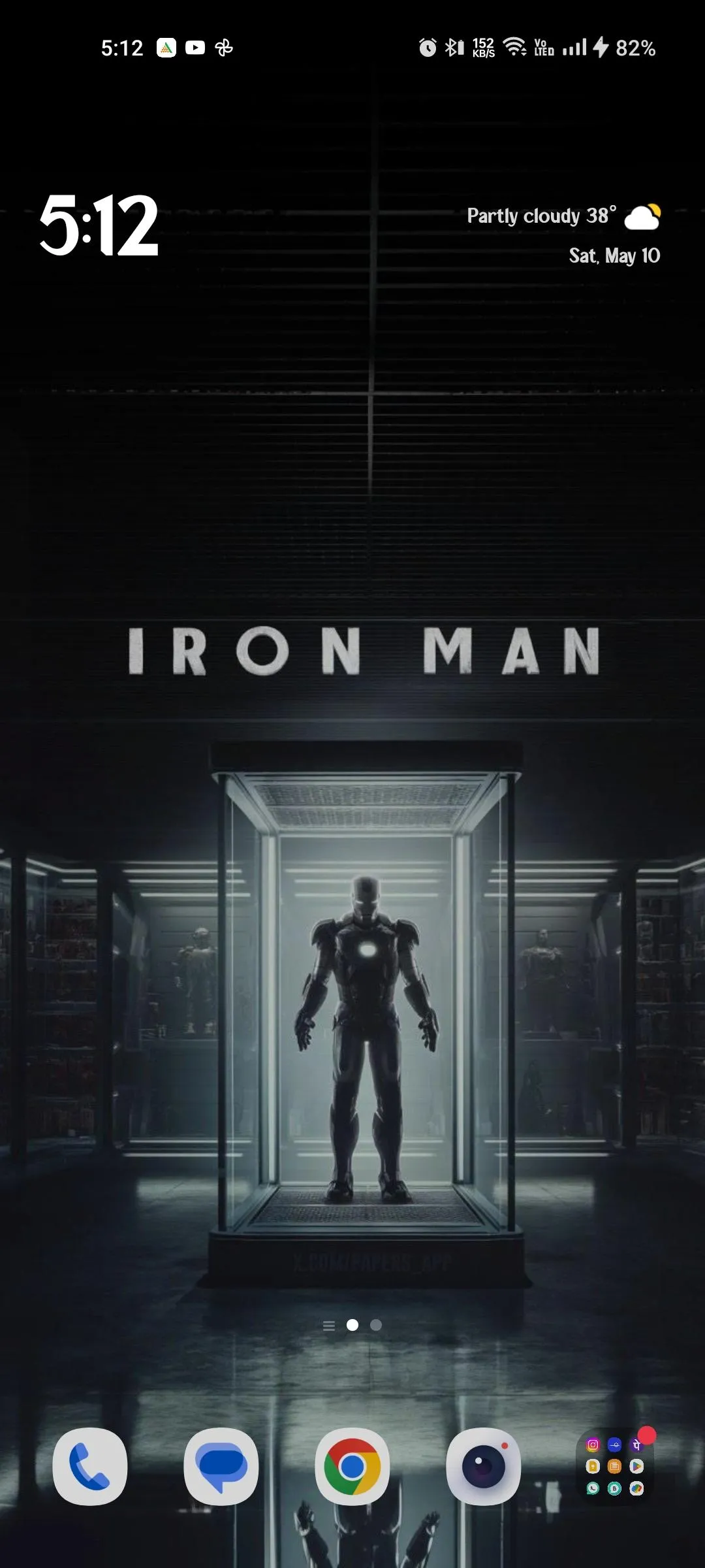 Iron Man Suit Display with Futuristic Interface Wallpaper