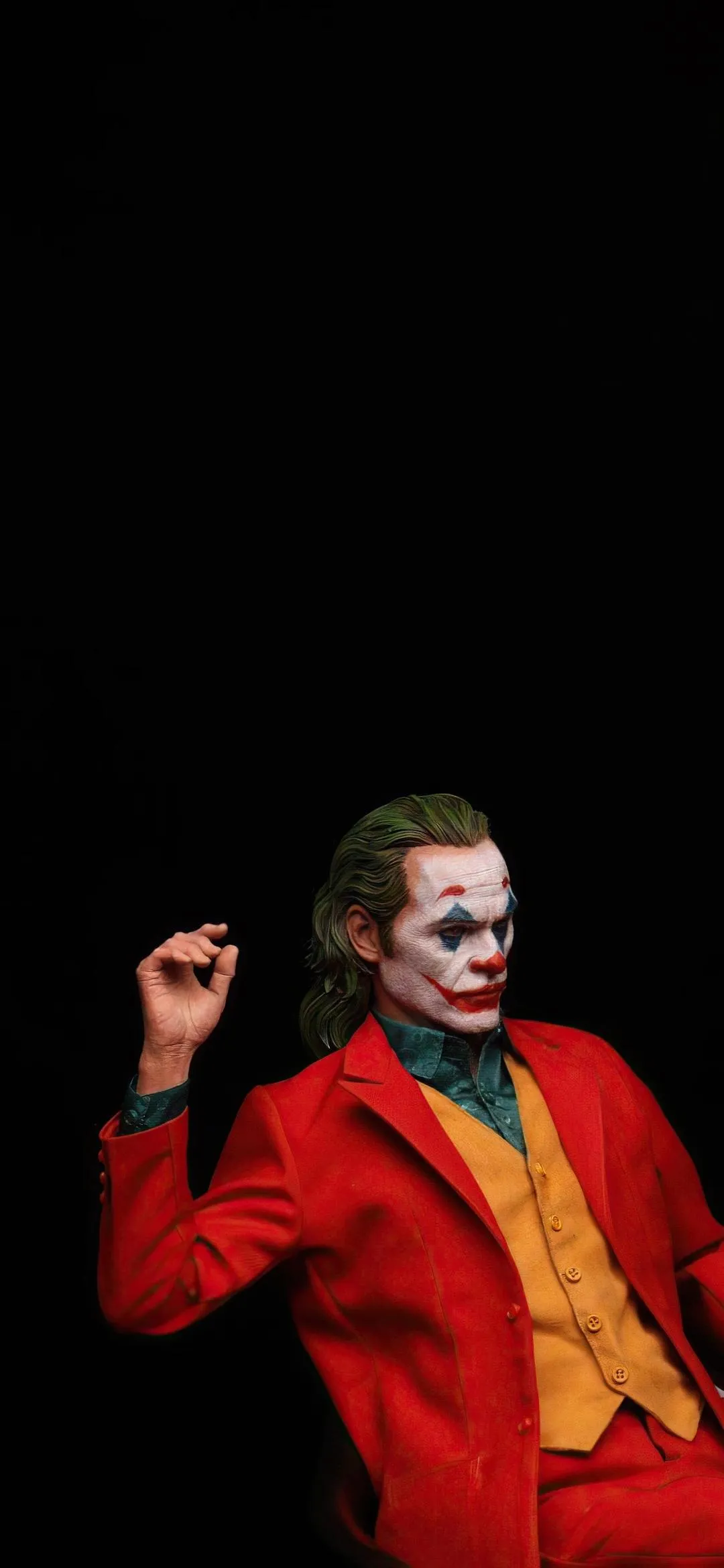 Joker Artwork with Red Suit and Confident Pose Wallpaper