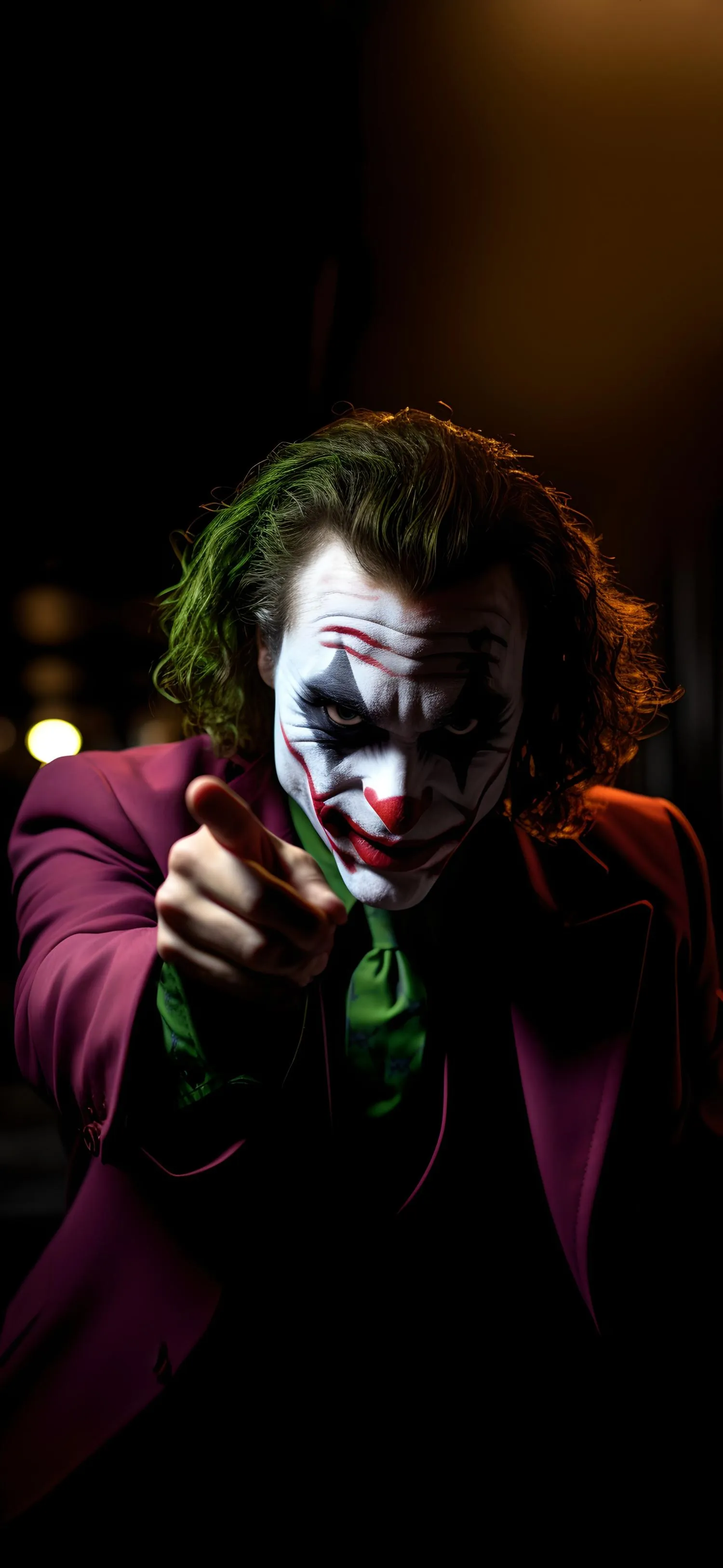 Joker with Green Hair and Sinister Laugh Pose Wallpaper