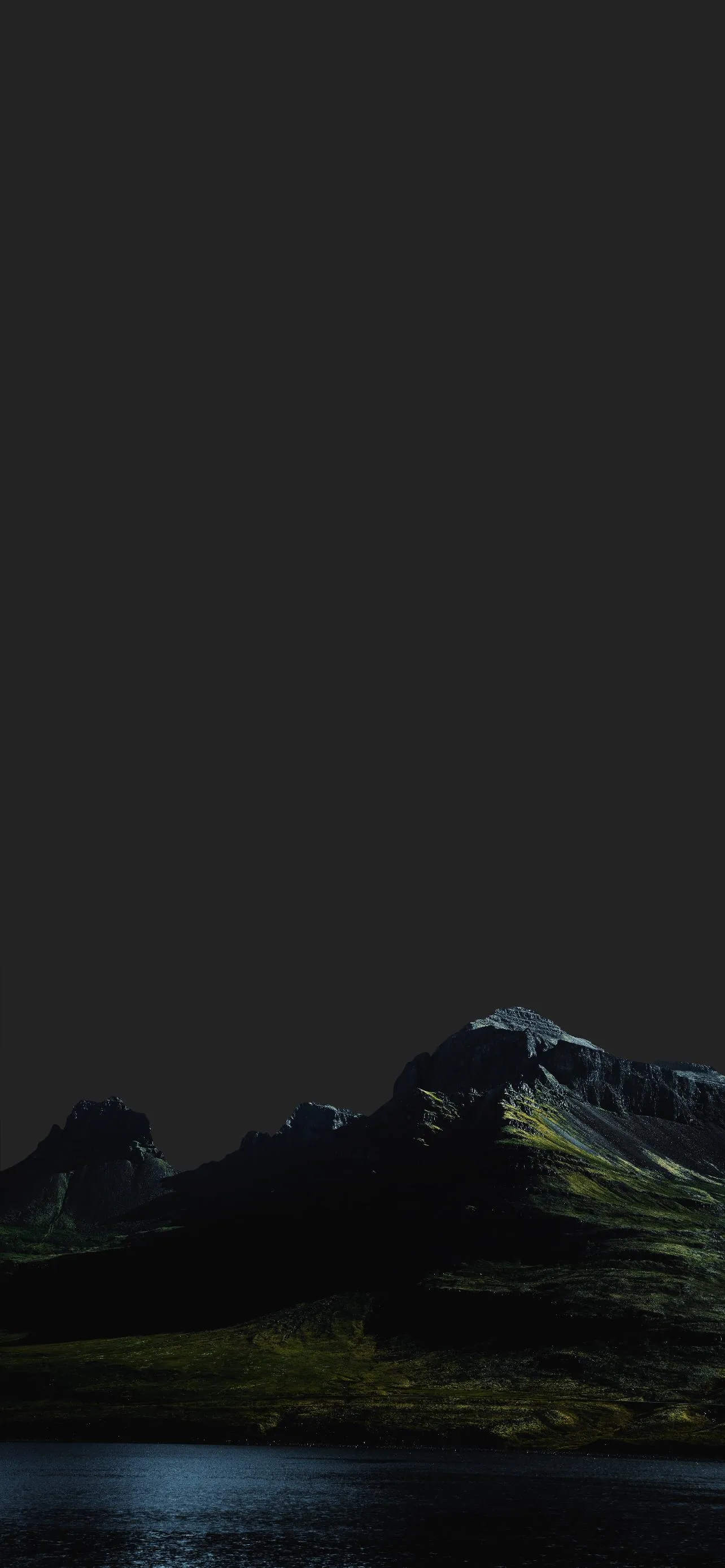 Lonely Mountain Peak Surrounded by Dark Misty Clouds