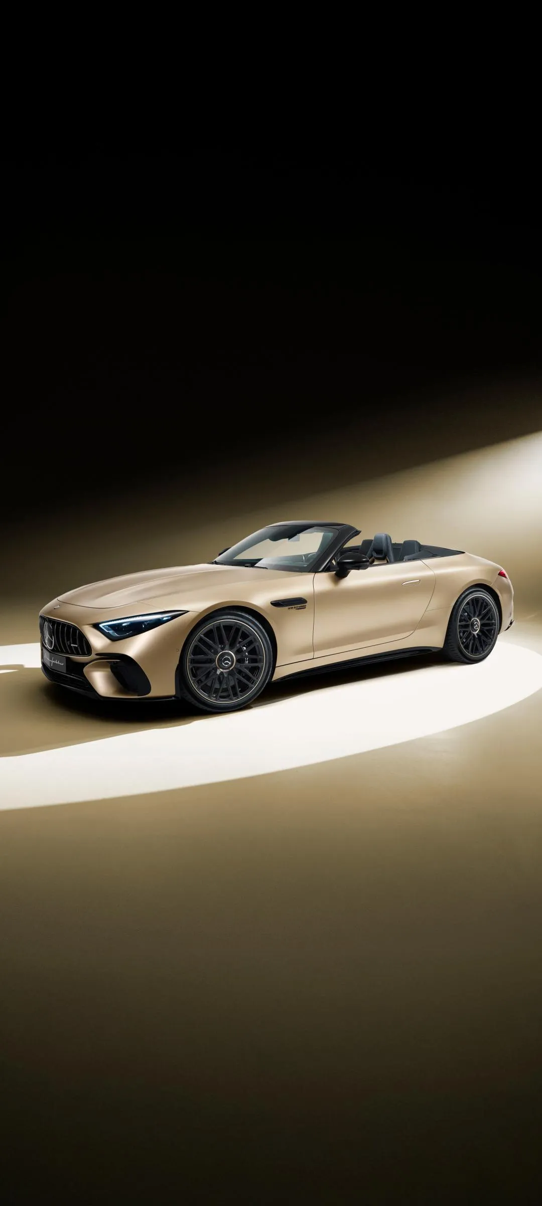 Luxurious Sports Car Driving at Golden Hour Wallpaper