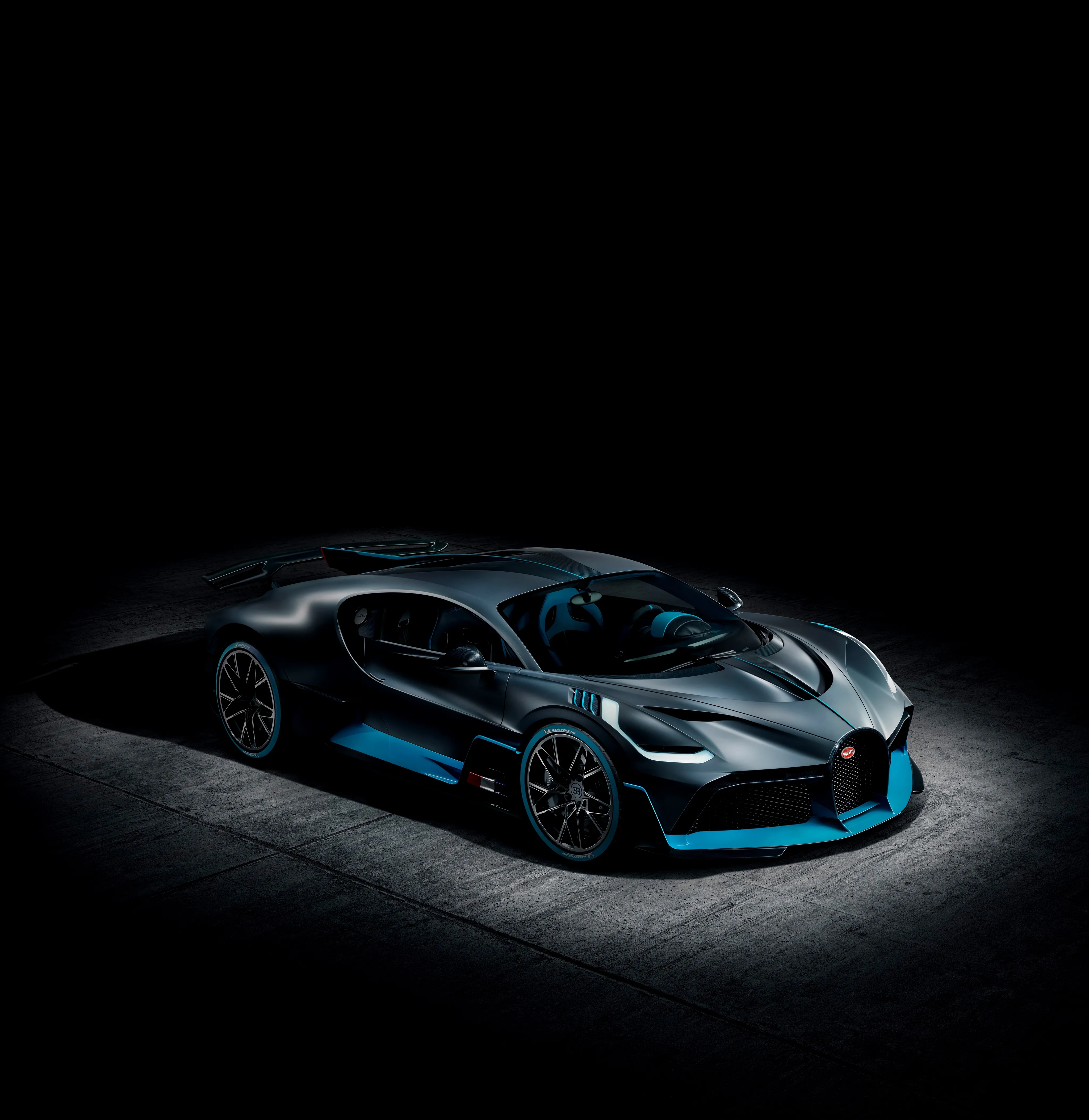 Luxury Sports Car in Dark Studio with Neon Lighting Image