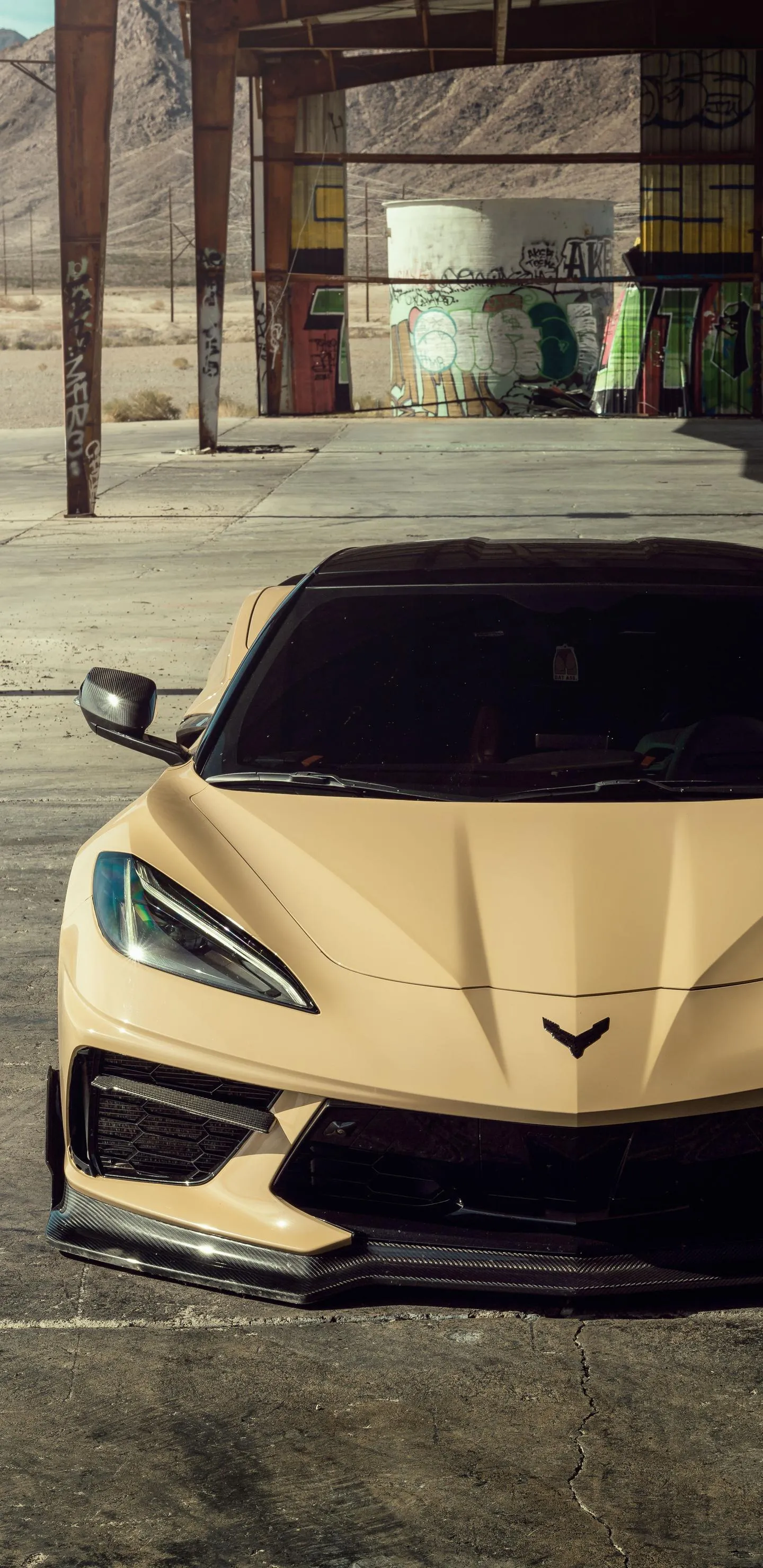 Luxury Sports Car Parked Indoors with Modern Lighting