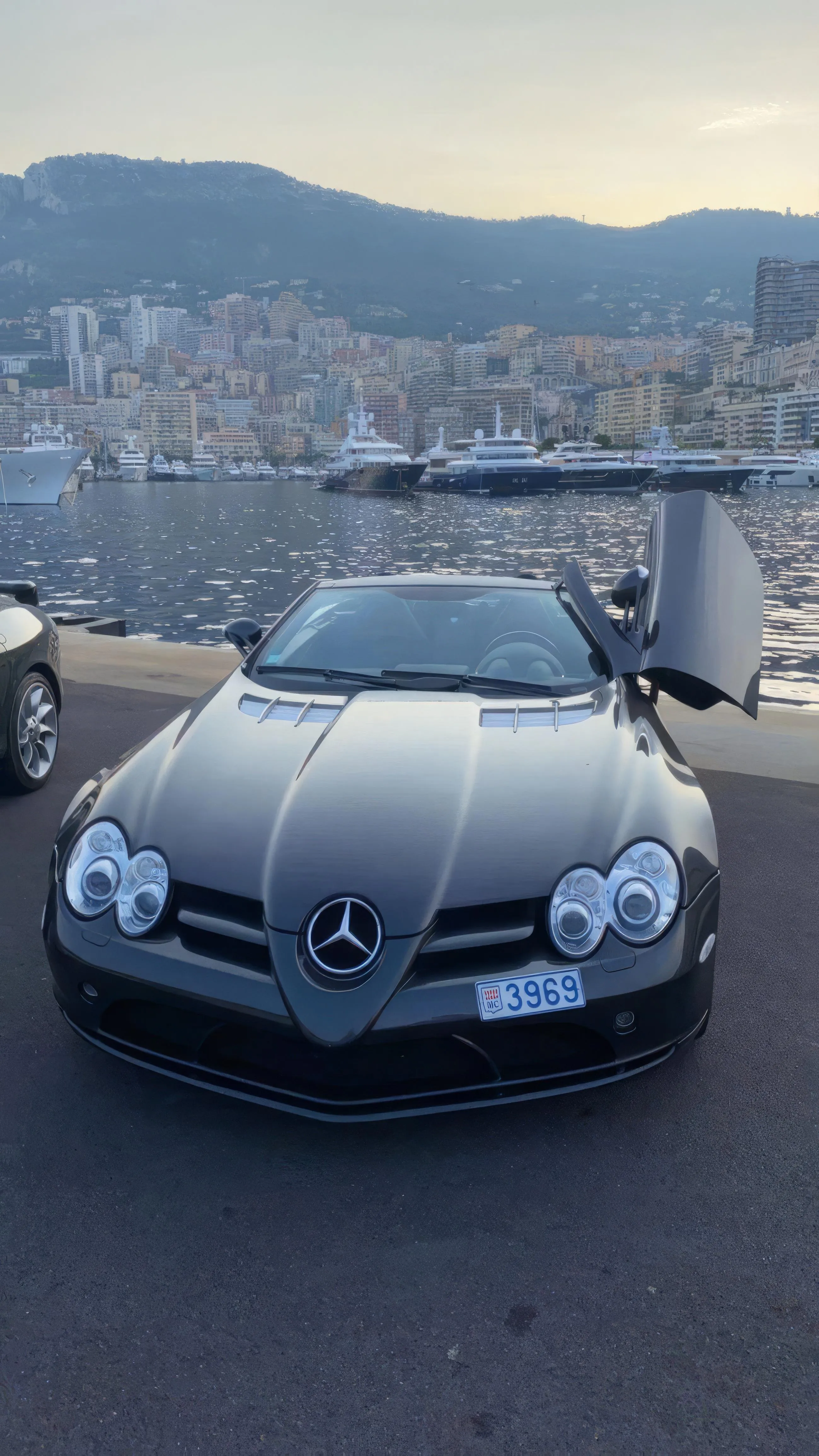 Luxury Sports Car Parked Near Mountain View Wallpaper