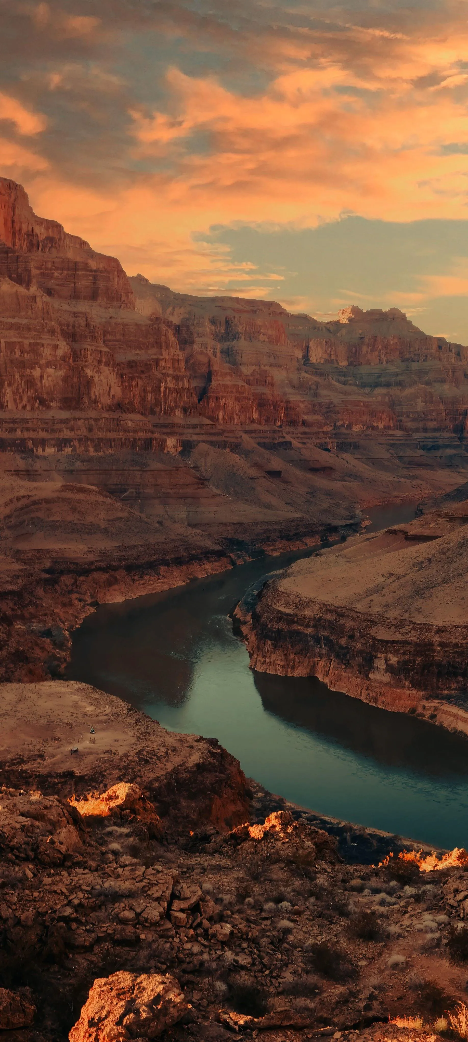 Majestic Canyon River at Sunset with Orange Sky Wallpaper