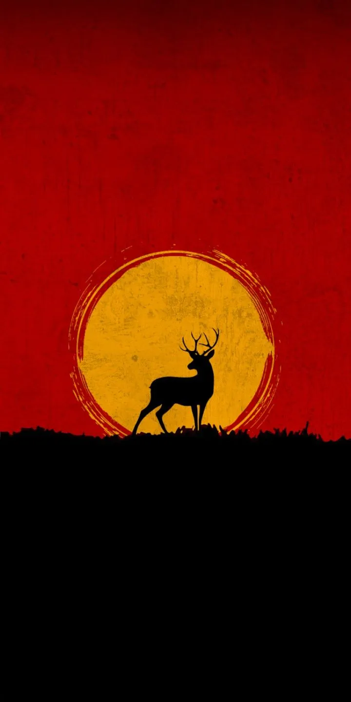 Majestic Deer at Red Sunset in Dark Silhouetted Landscape
