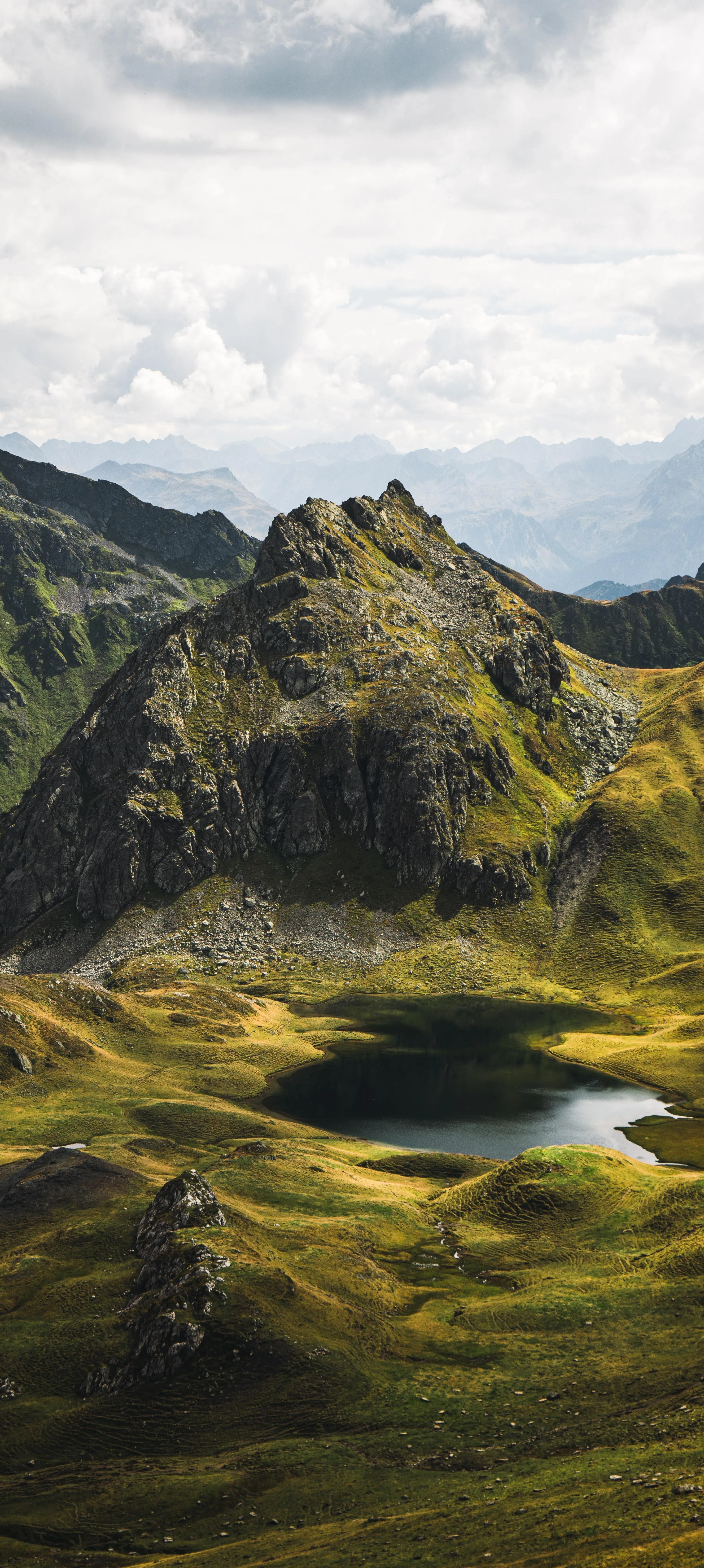 Majestic Mountain Landscape with Clouds and Clear Sky