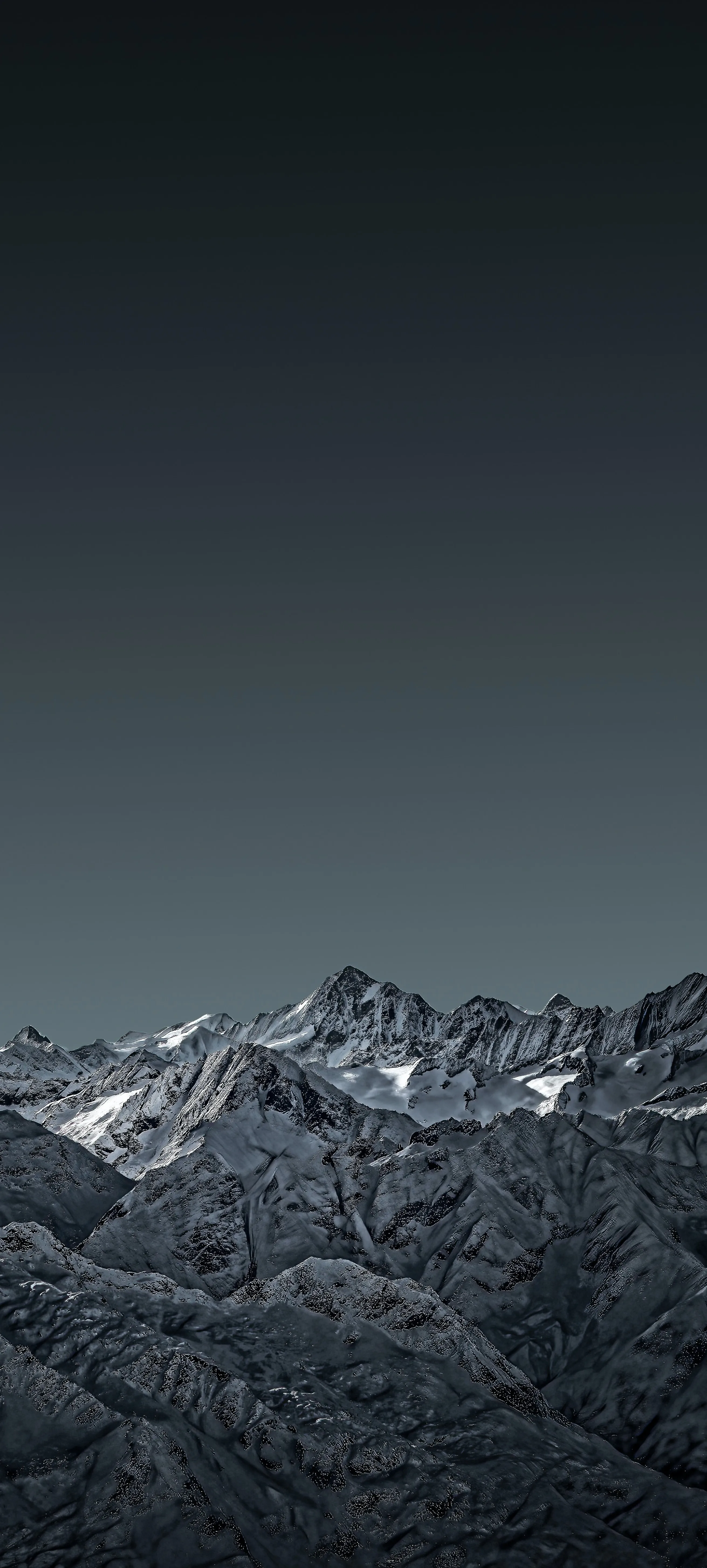 Majestic Mountain Range Under Clear Night Sky Wallpaper