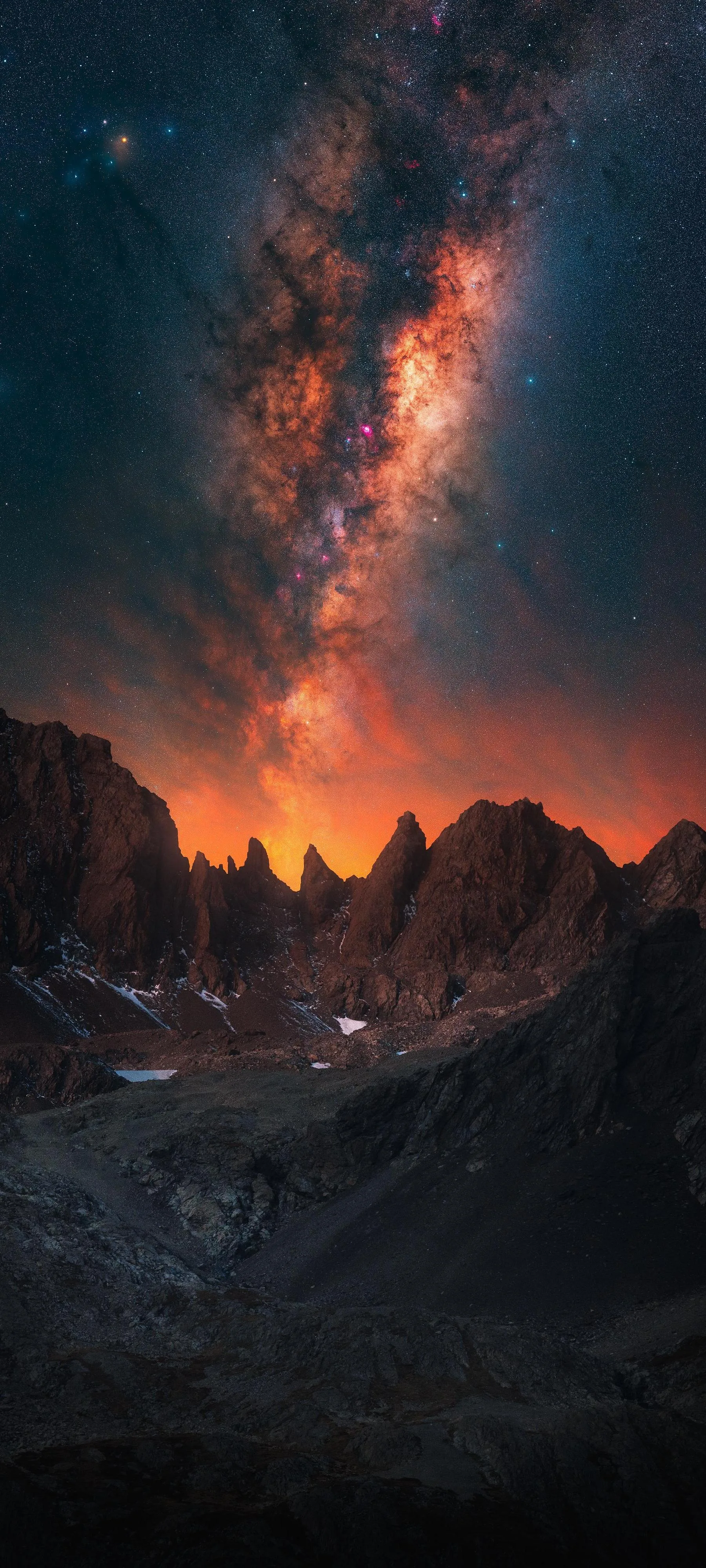 Majestic Mountain Sunset with Glowing Orange Sky Wallpaper