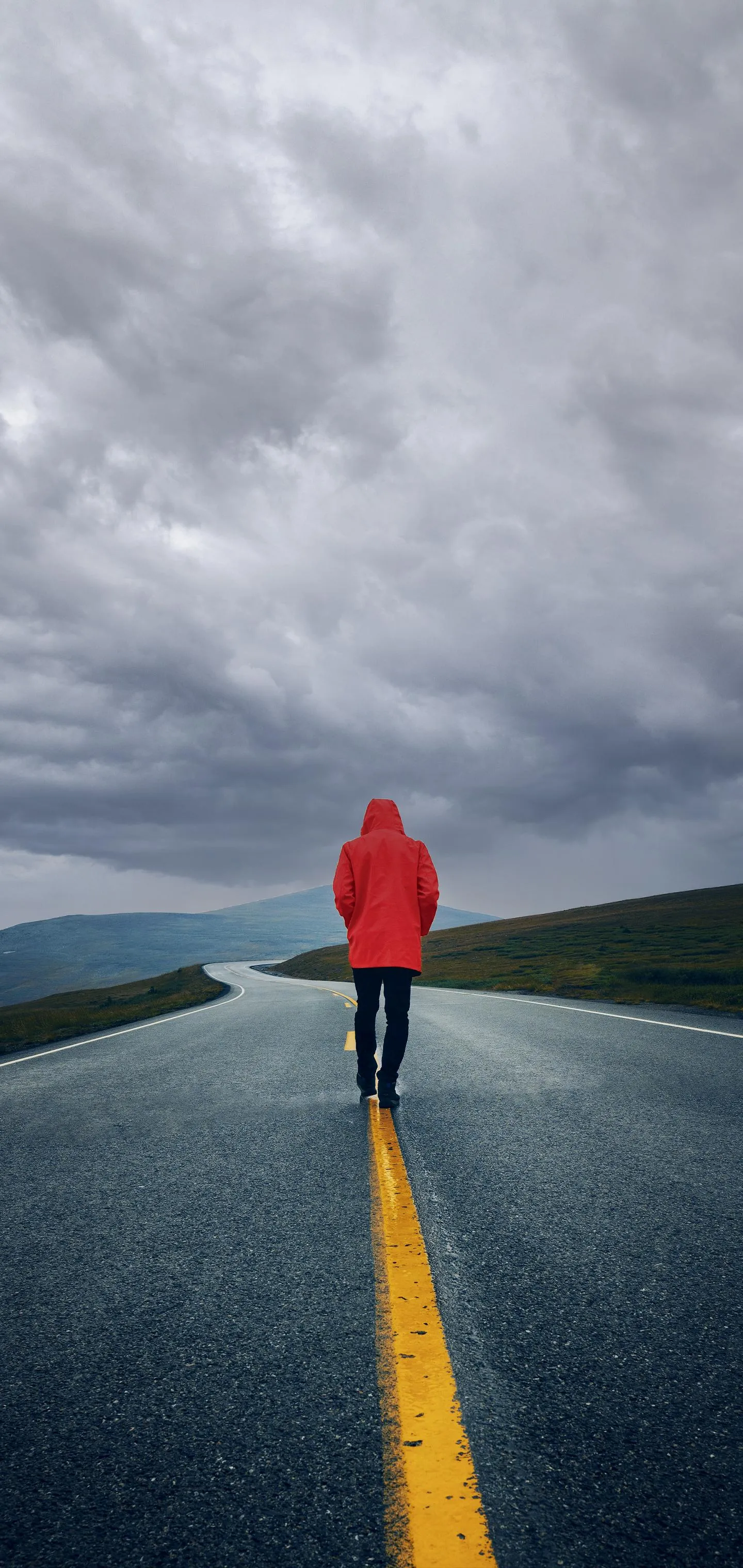 Man Walking Alone on Road Moody Travel Adventure Theme