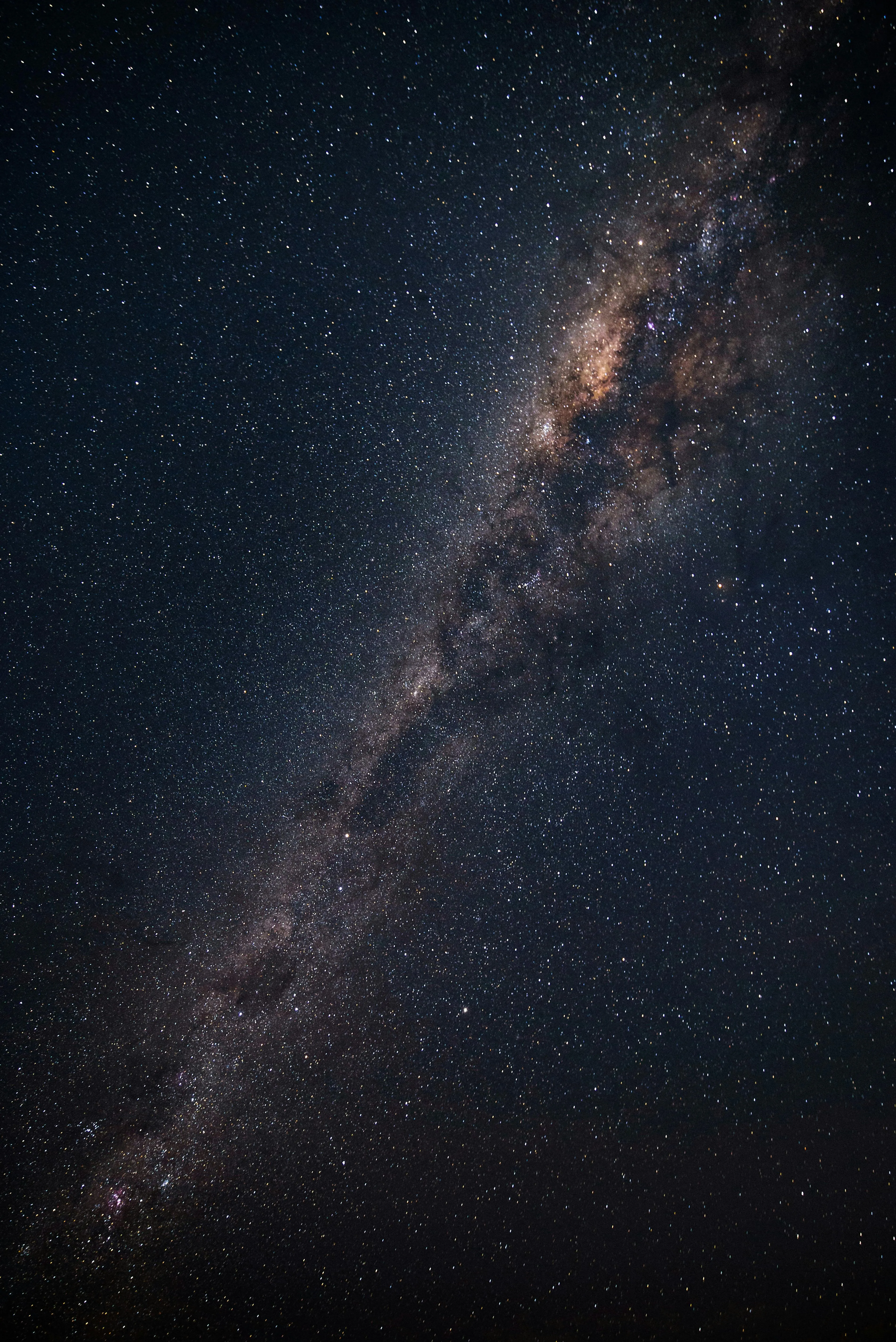 Milky Way Galaxy Shining Over Dark Night Sky Wallpaper