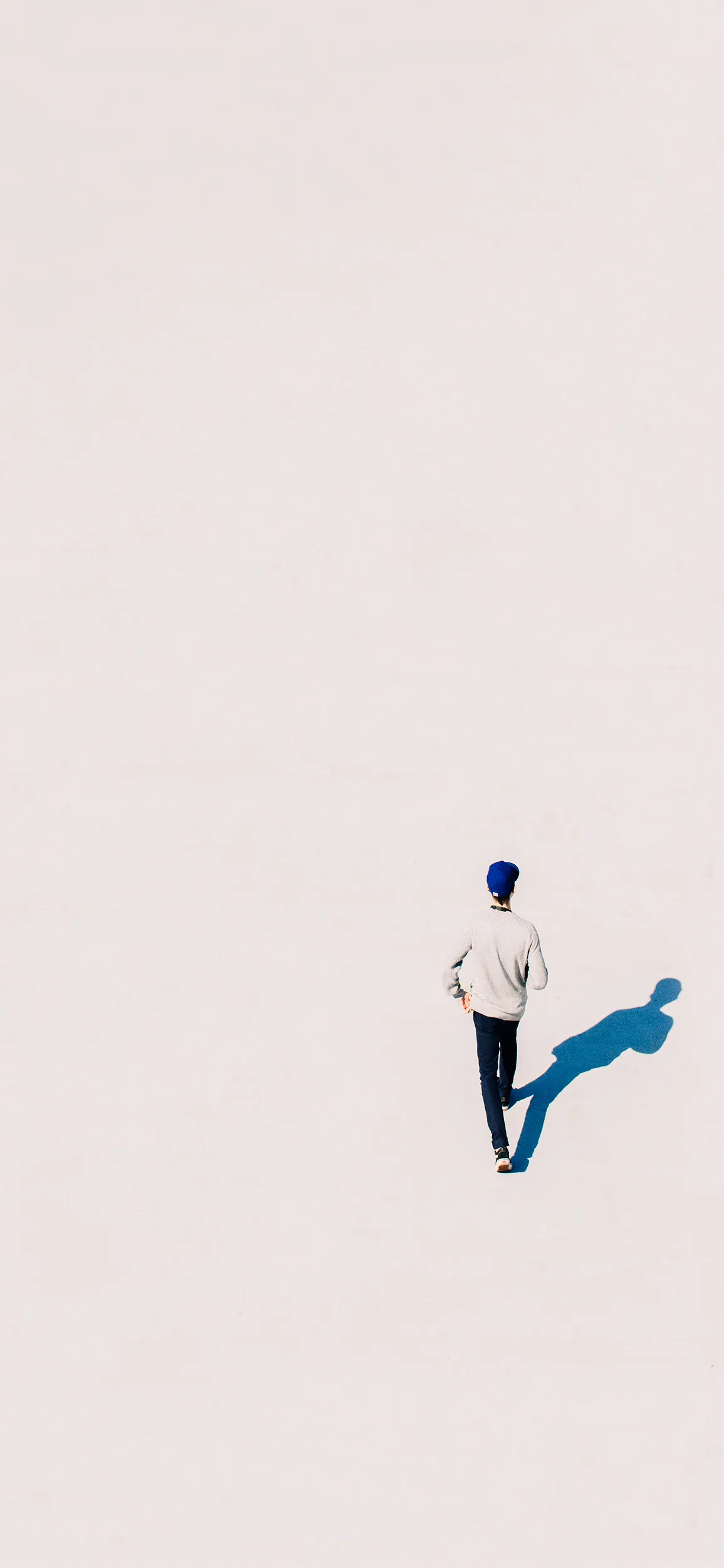 Minimalist Man Standing against White Background