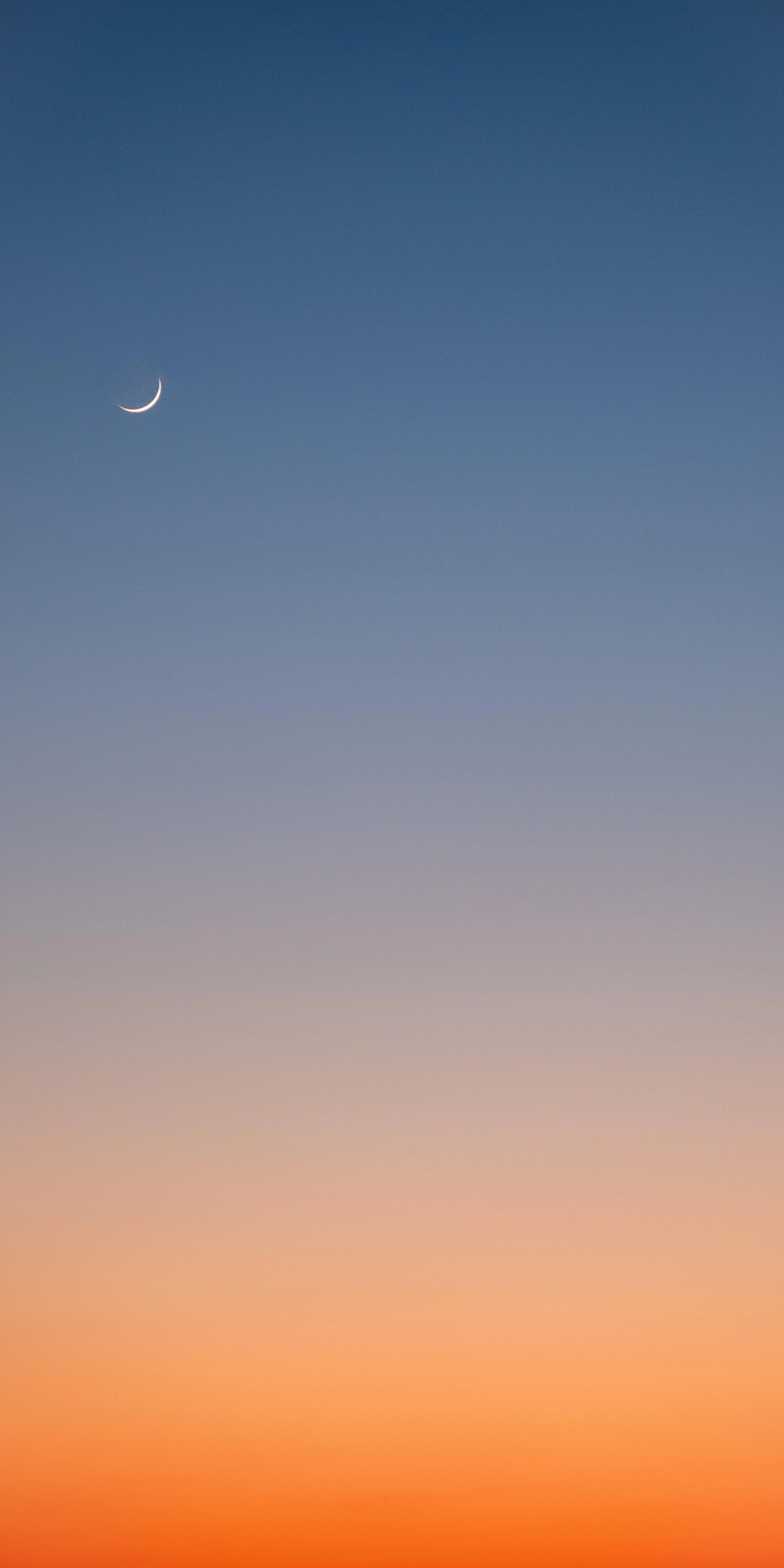Minimalist Orange and Blue Sky with Crescent Moon Image