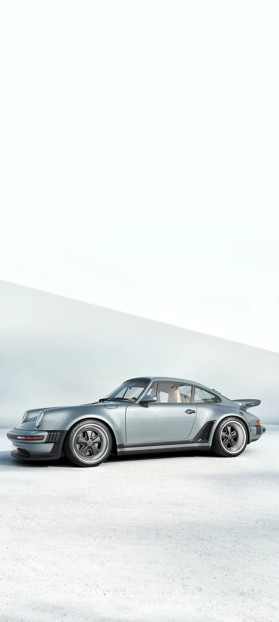 Minimalist Silver Car in a Calm Modern Landscape Wallpaper