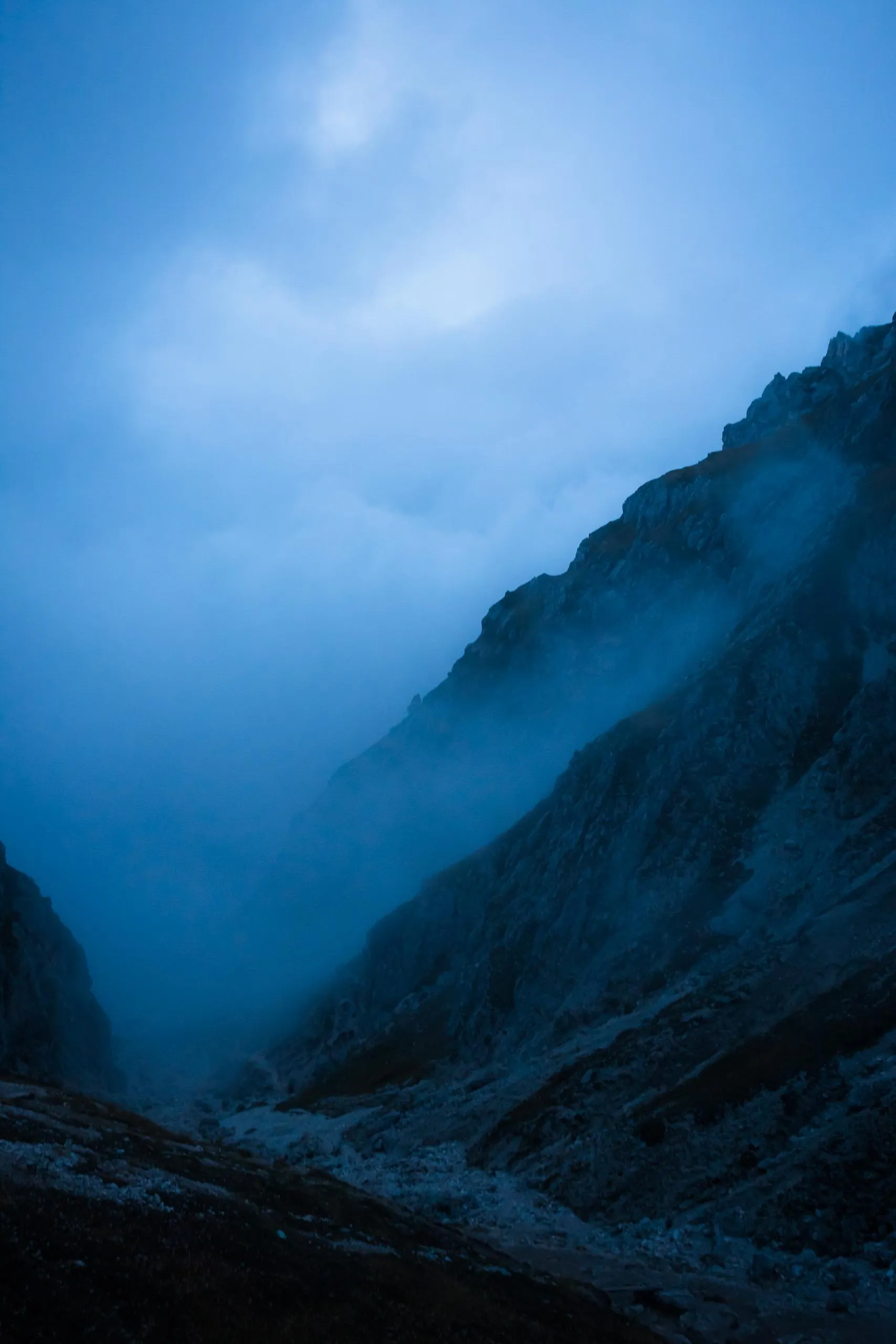Misty Blue Mountains under Evening Twilight Wallpaper