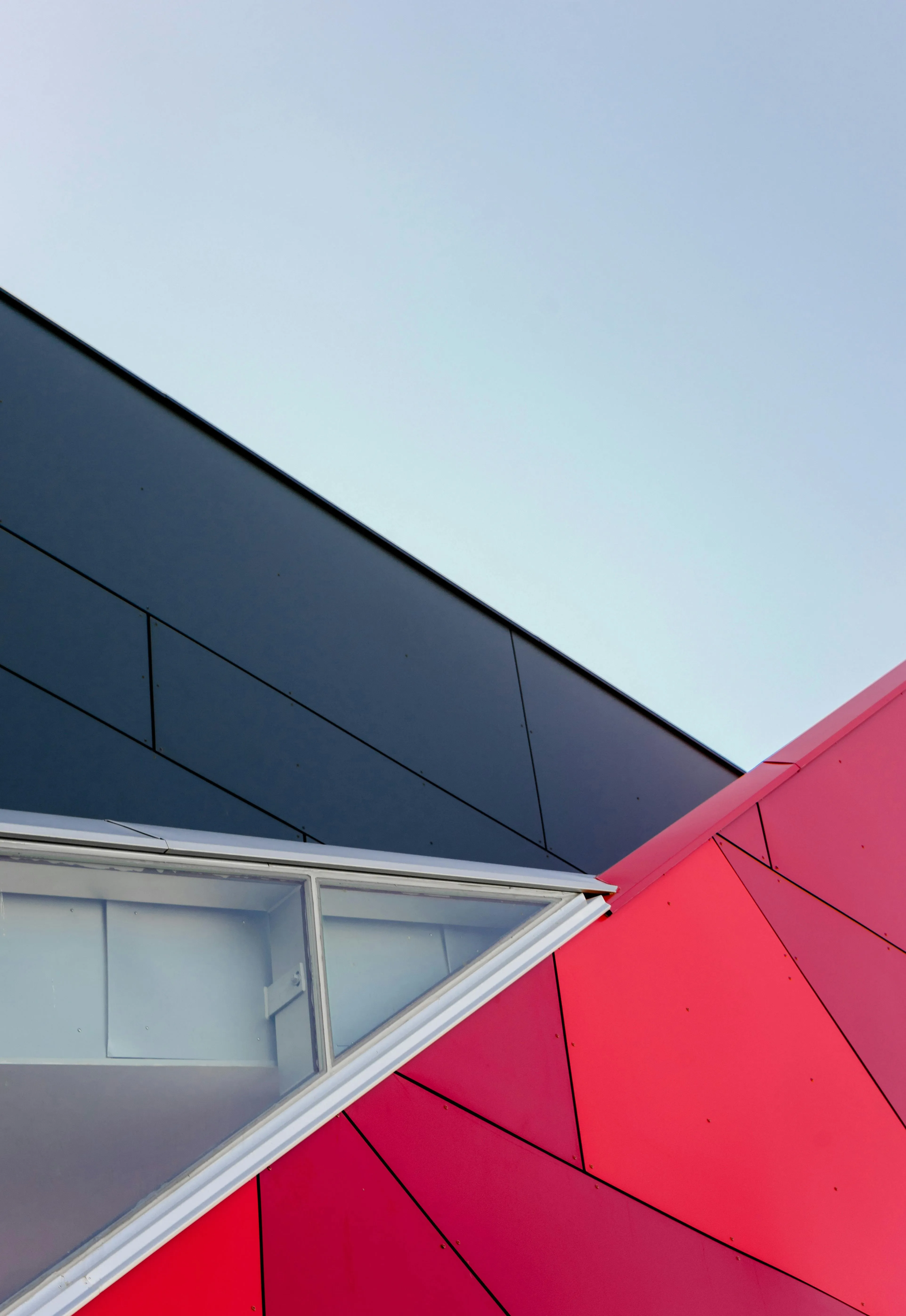 Modern Architecture with Bold Red and Gray Shapes Wallpaper