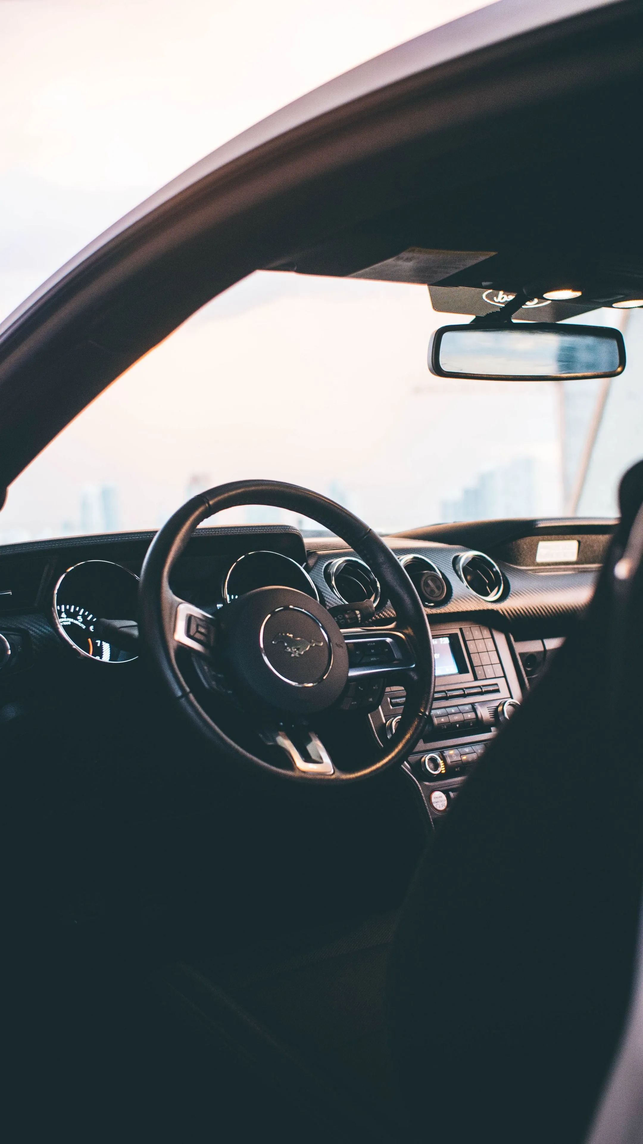 Modern Car Interior Showing Steering Wheel and Dashboard
