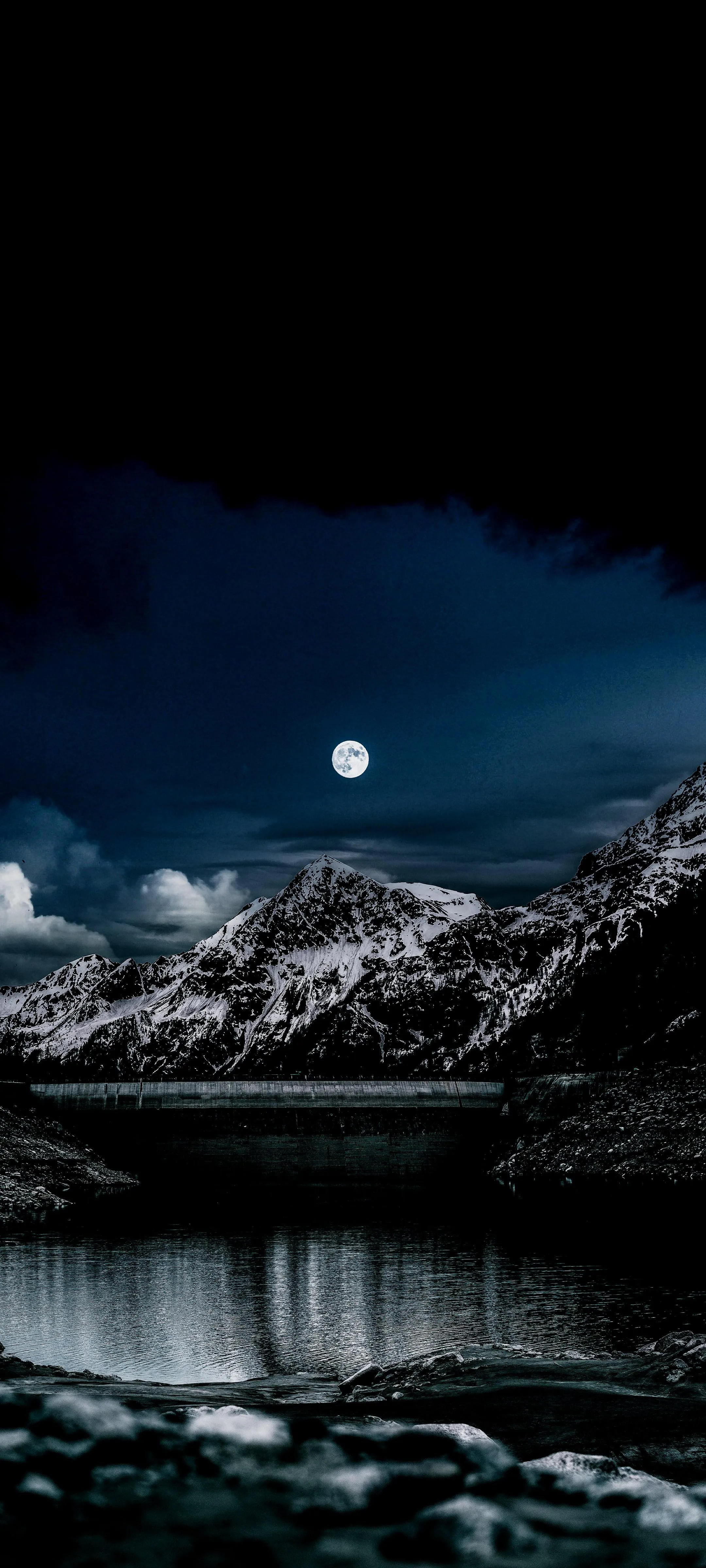 Moonlit Lake With Mountains Framed Under Deep Dark Sky
