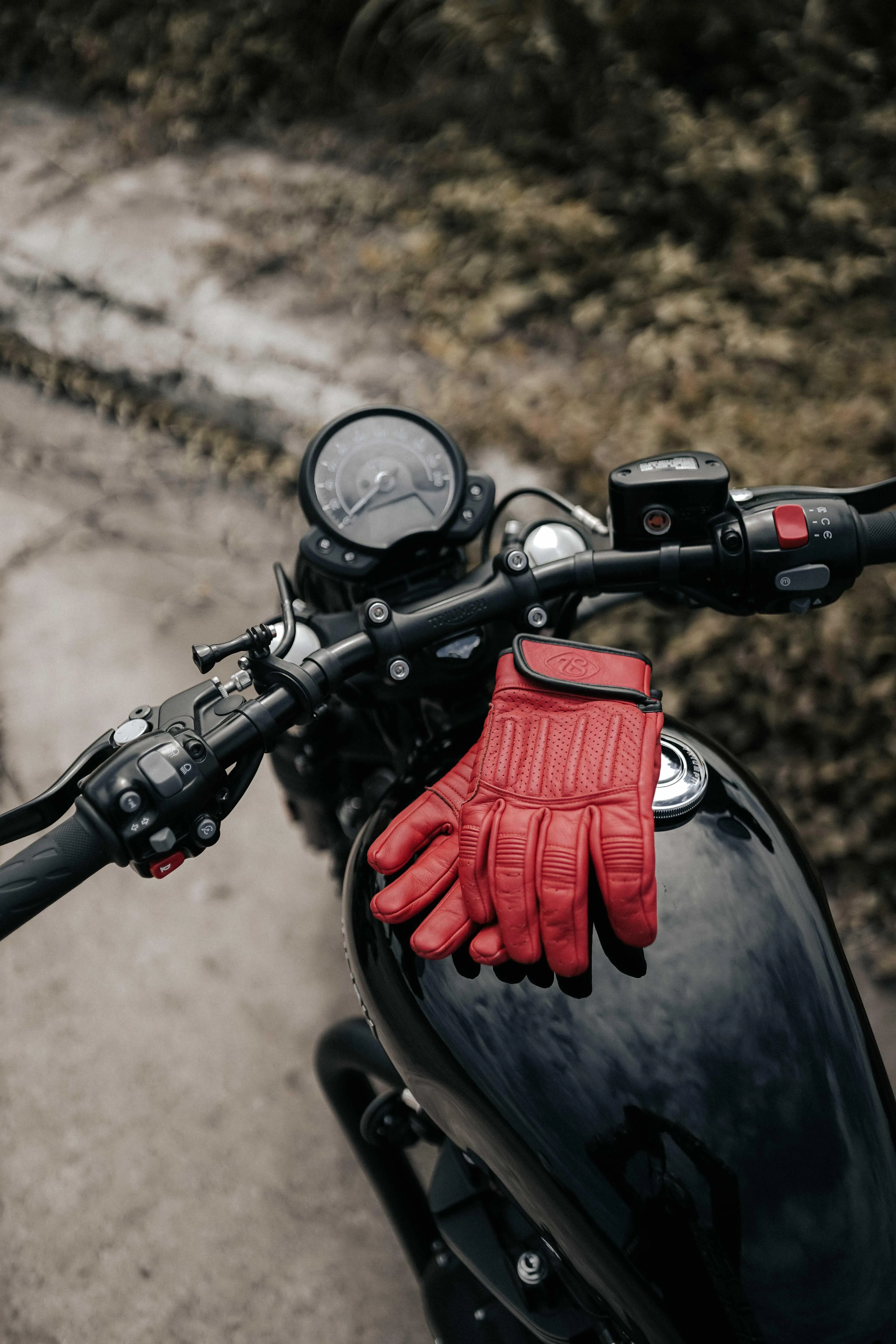 Motorcycle Glove Placed Firmly on a Handlebar Grip