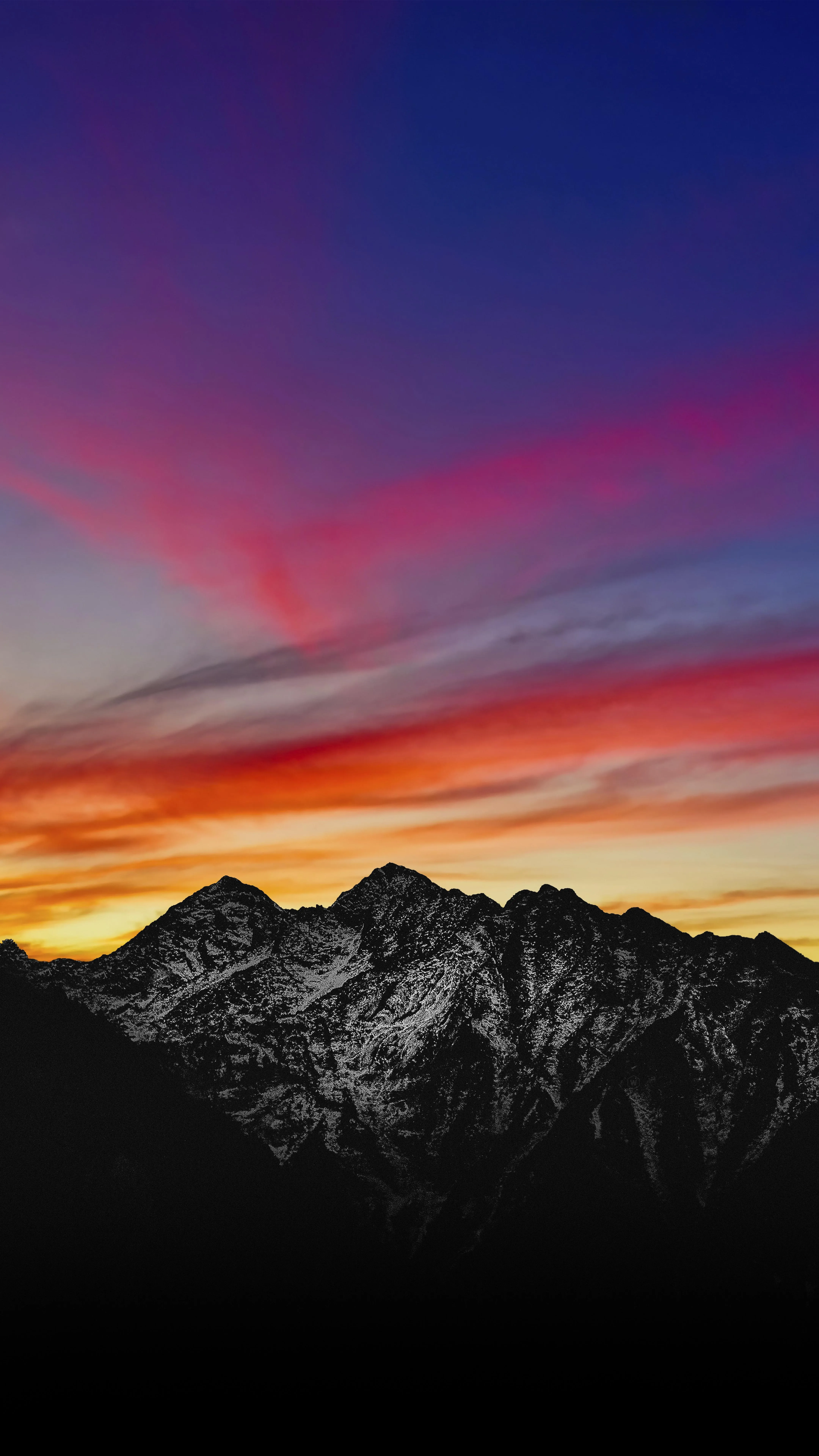 Mountain Landscape at Sunset with Pink and Blue Sky Colors