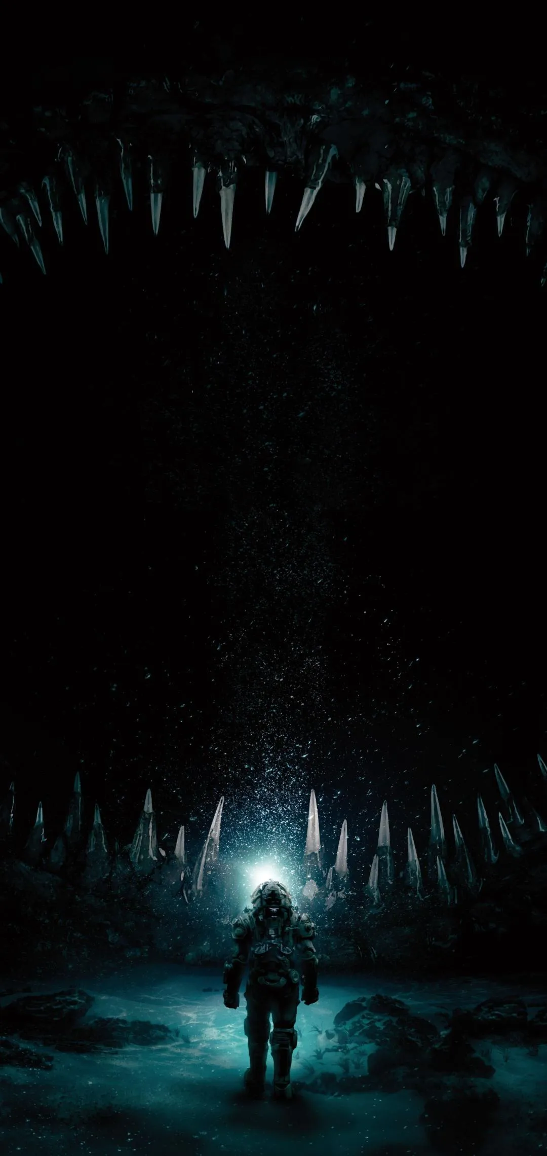 Mysterious Cave Scene with Glowing Blue Light Wallpaper