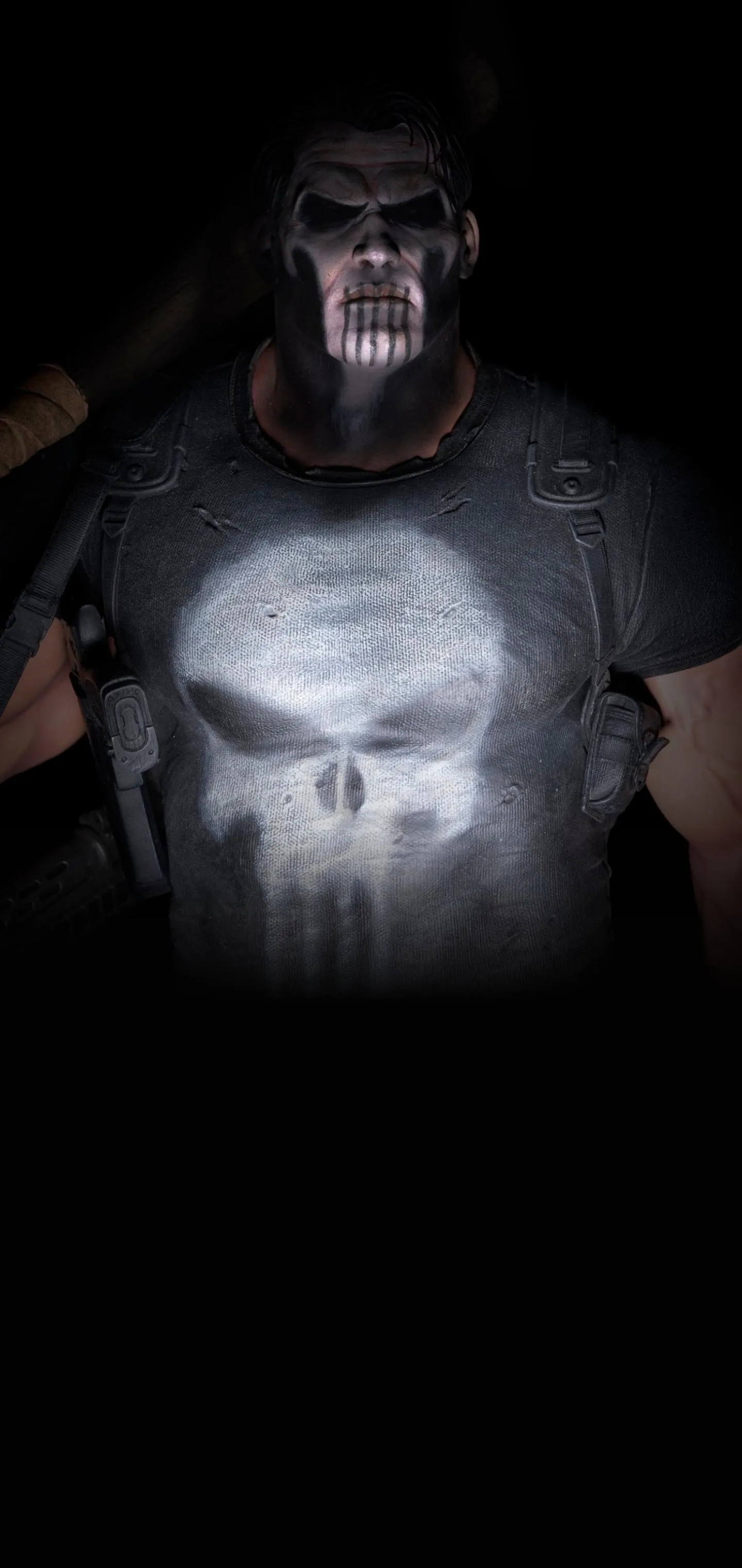 Mysterious Man Reading Glowing Skull in Dark Room Wallpaper