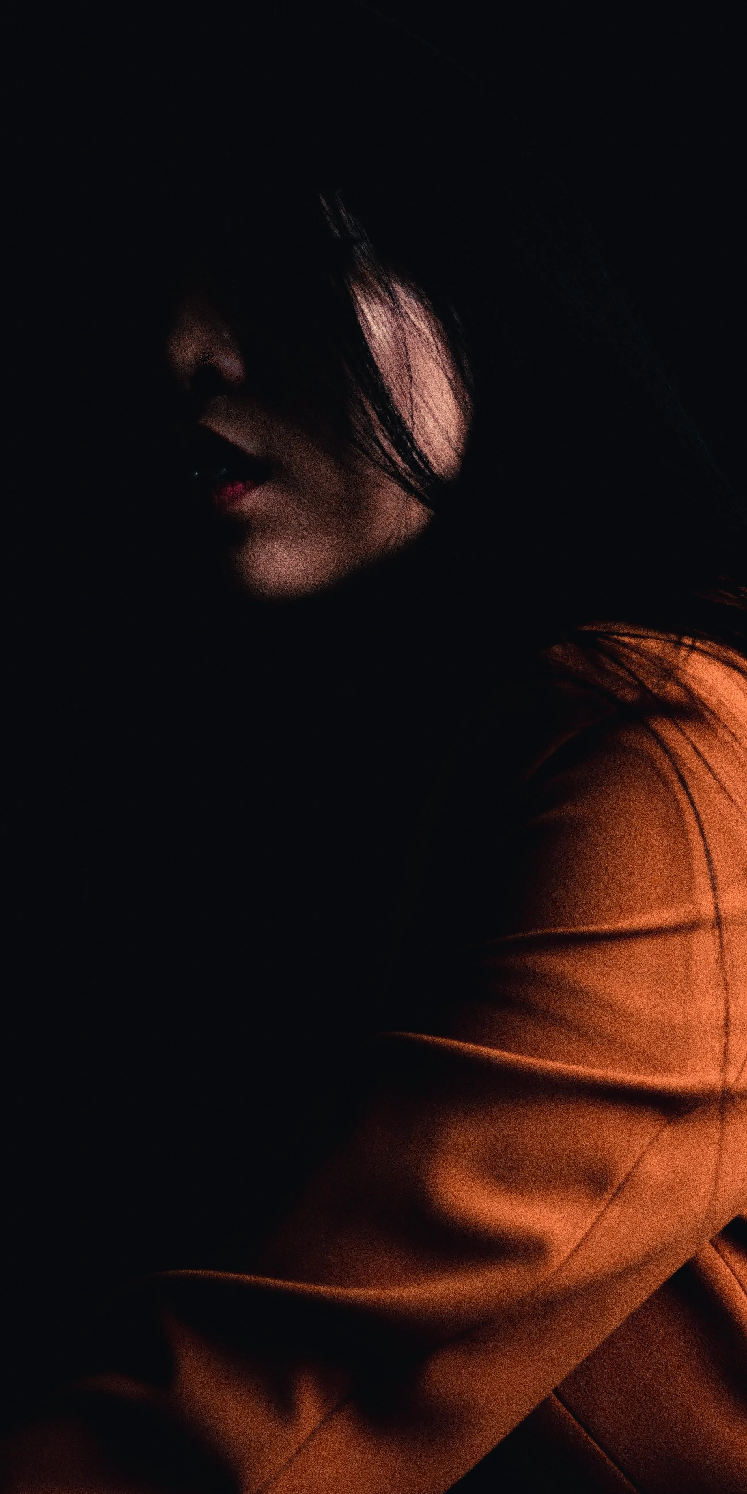 Mysterious Woman in Dark with Lighting 4K Wallpaper