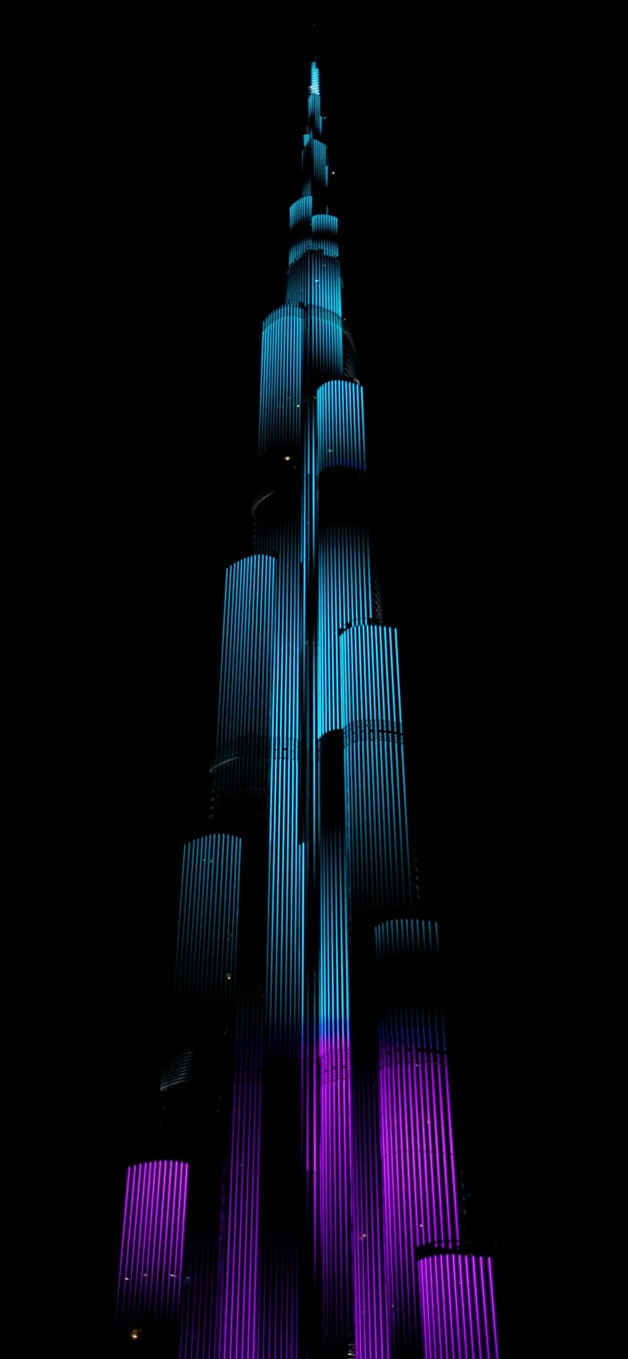 Neon City Skyscraper Lights Glowing In Night Skyline
