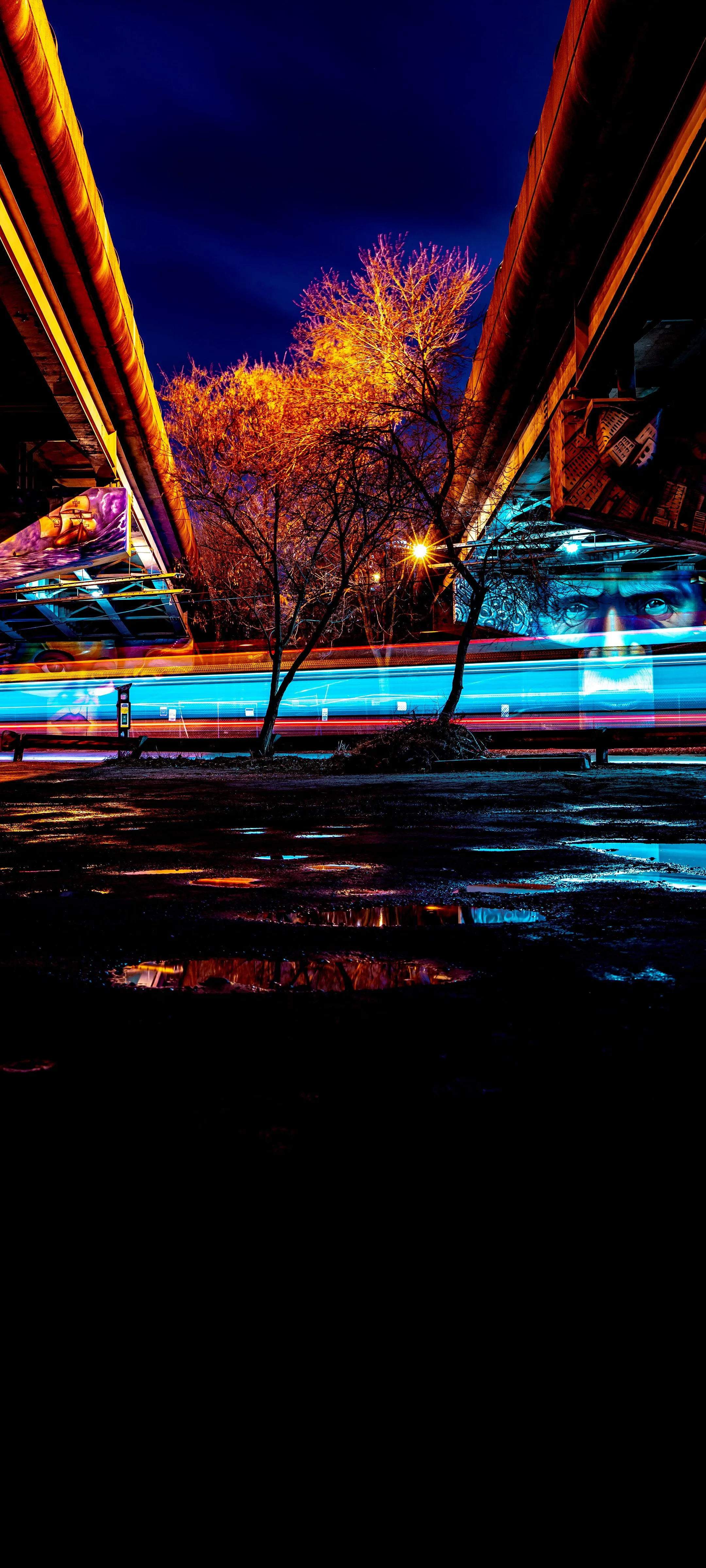 Night Road Reflections Showing Deep Orange and Blue Colors