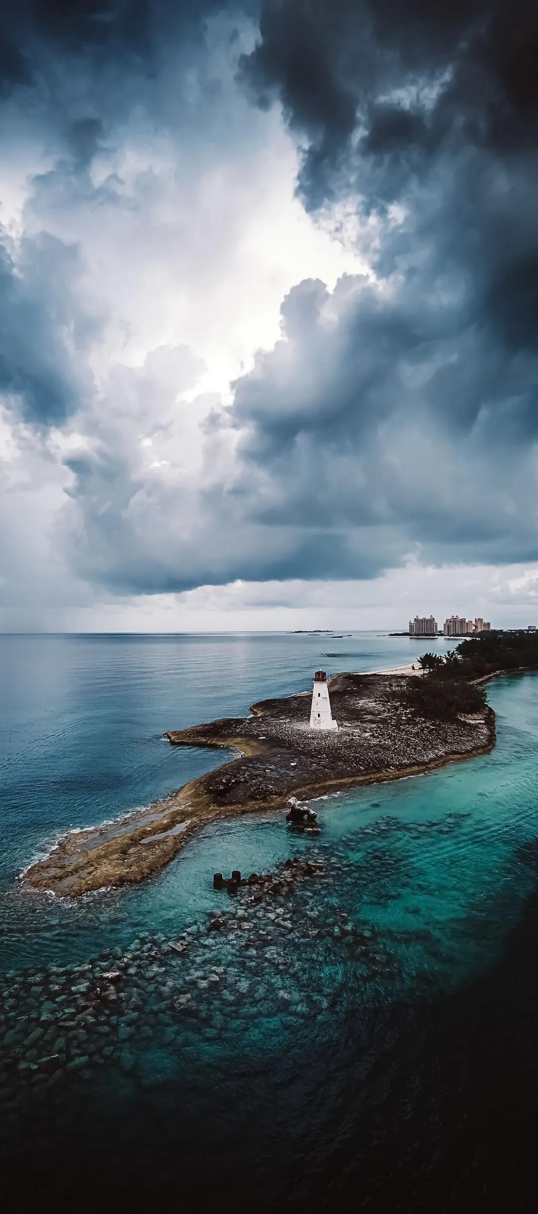 Ocean Waves Crashing Against Rocky Shore Wallpaper