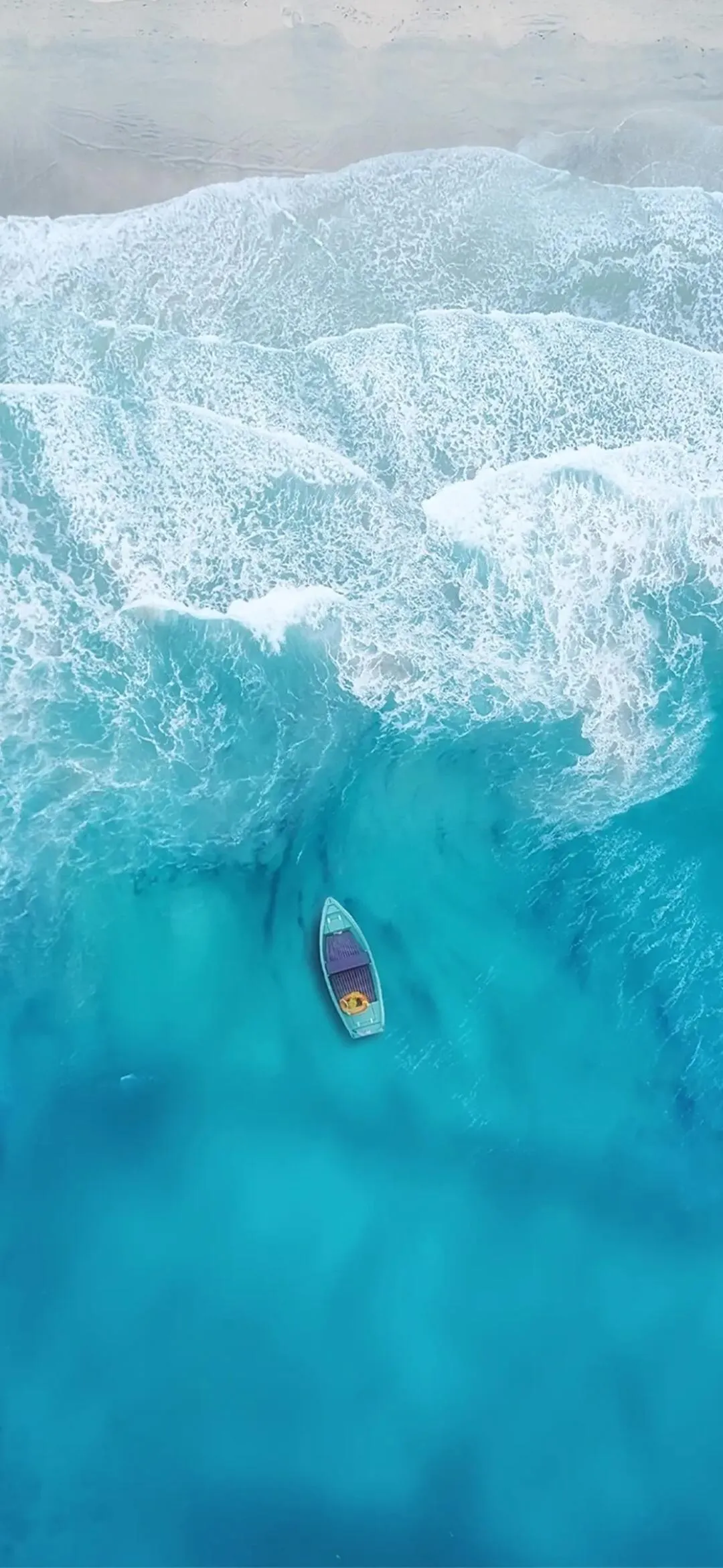 Overhead View of Swimmer in Turquoise Ocean Waters