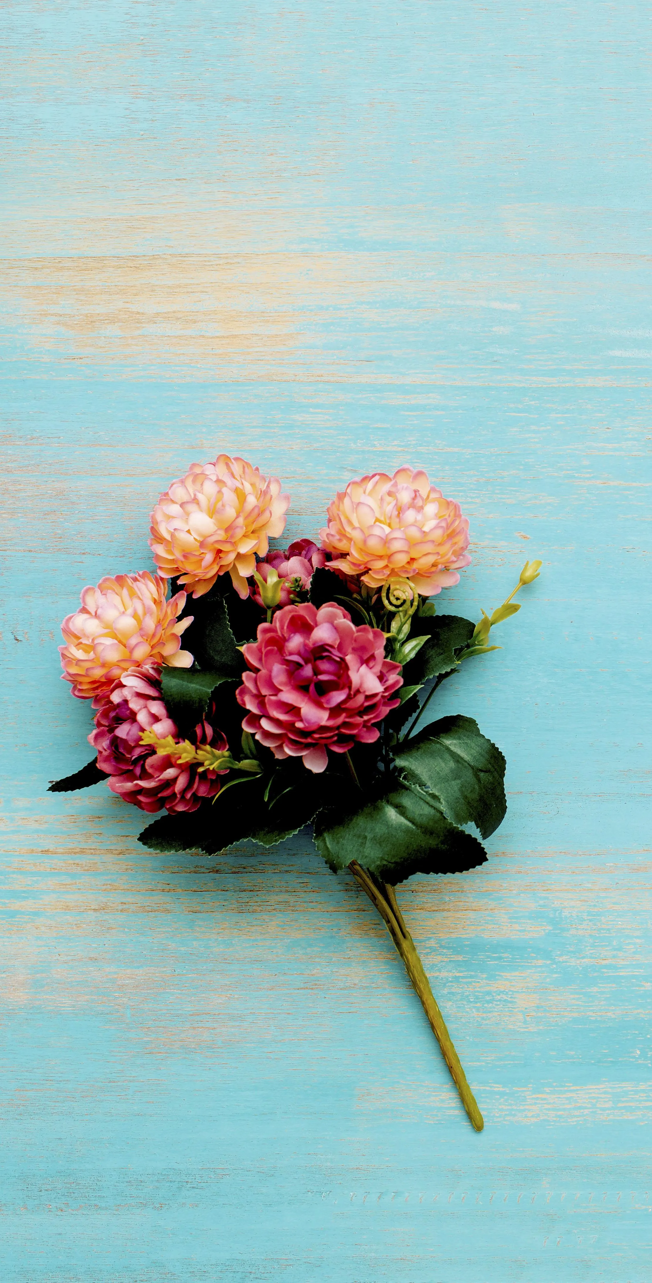 Pastel Background With Bouquet of Flowers Arranged Simply