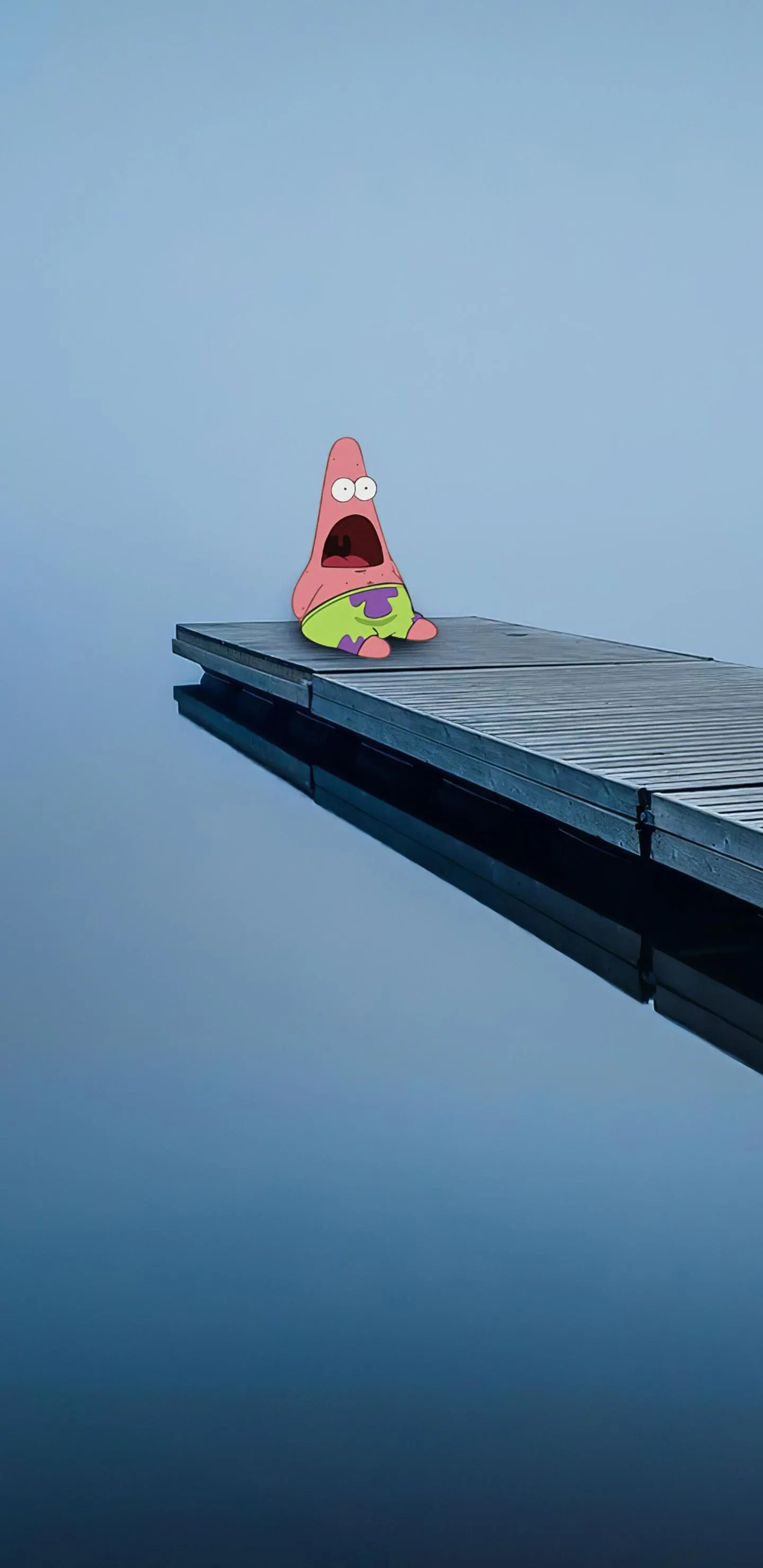 Patrick Star Shocked while Sitting on a Calm Dock Wallpaper