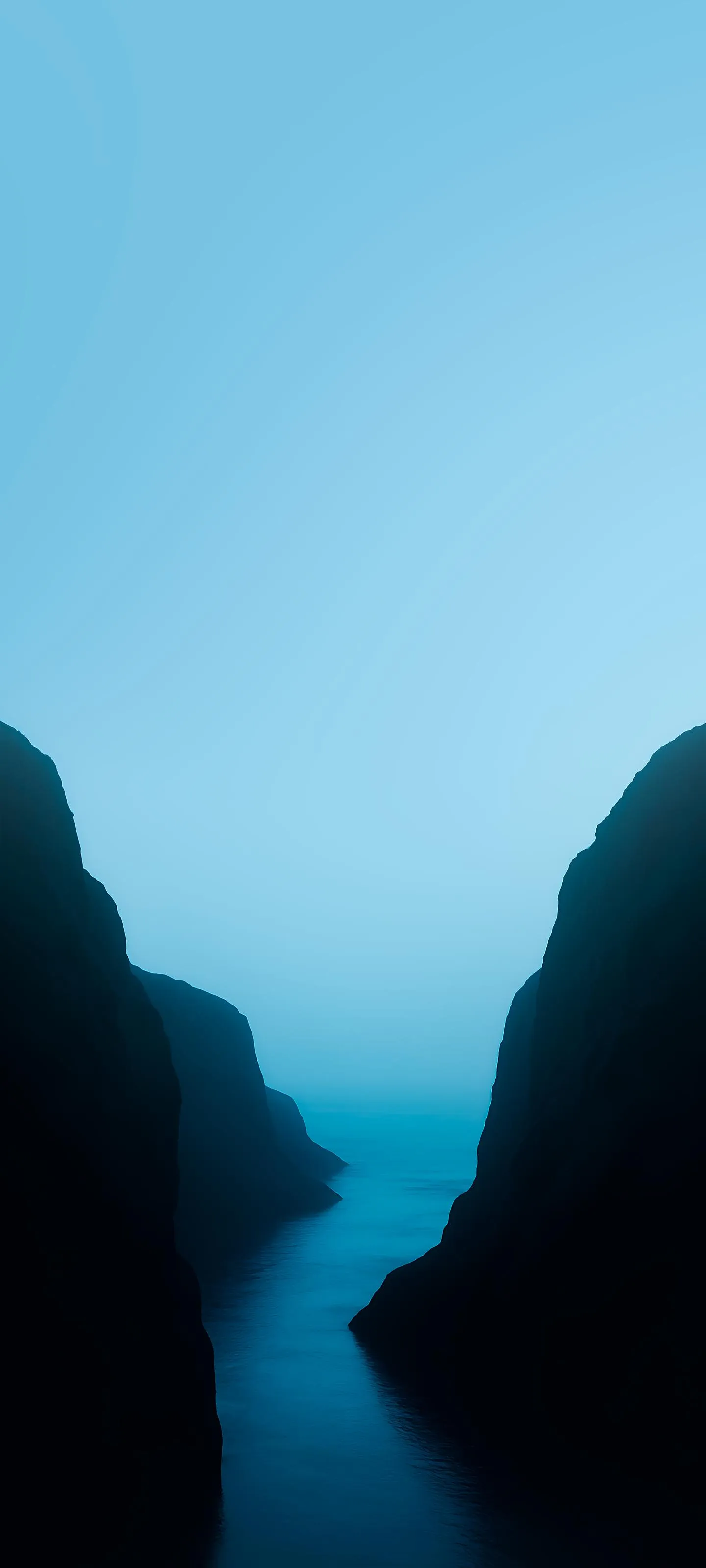Peaceful Blue Mountain Layers Under Clear Sky View