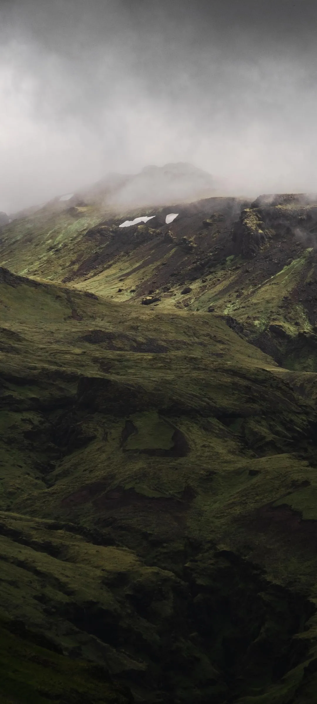Peaceful Green Hills and Cloudy Mountain Landscape