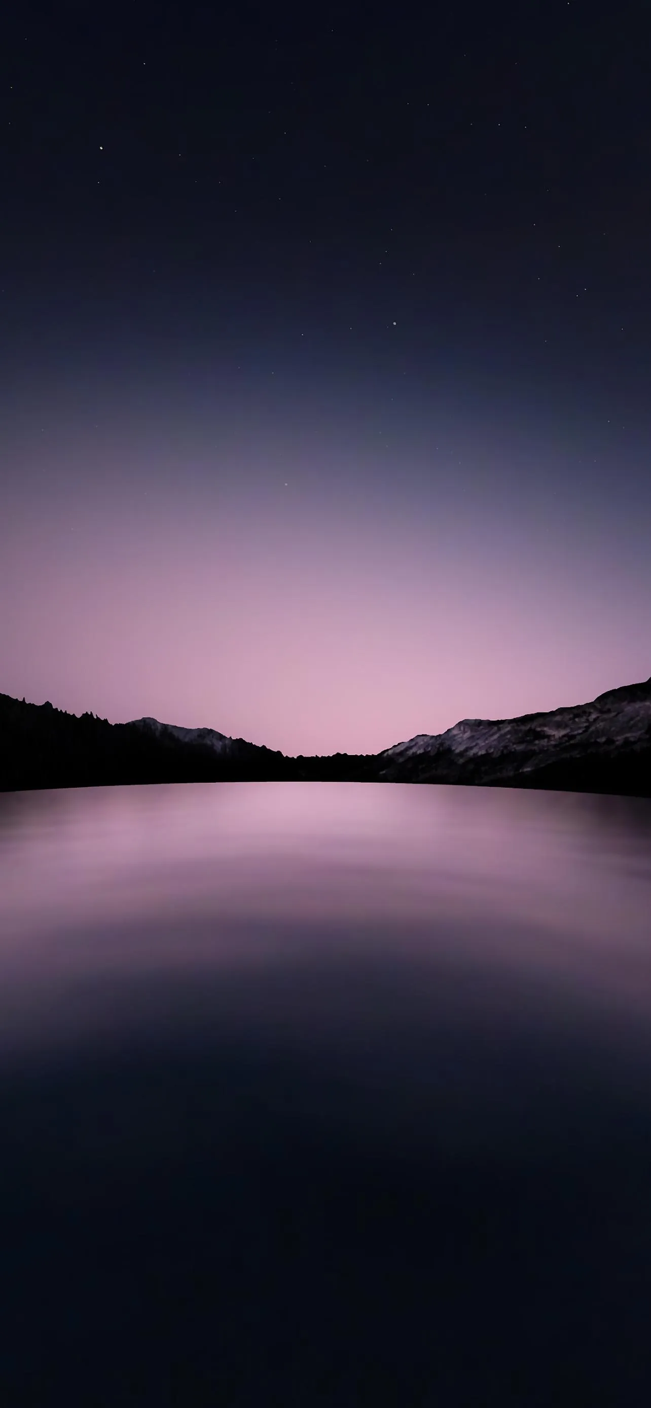 Peaceful Lake at Dusk with Gentle Reflections Wallpaper