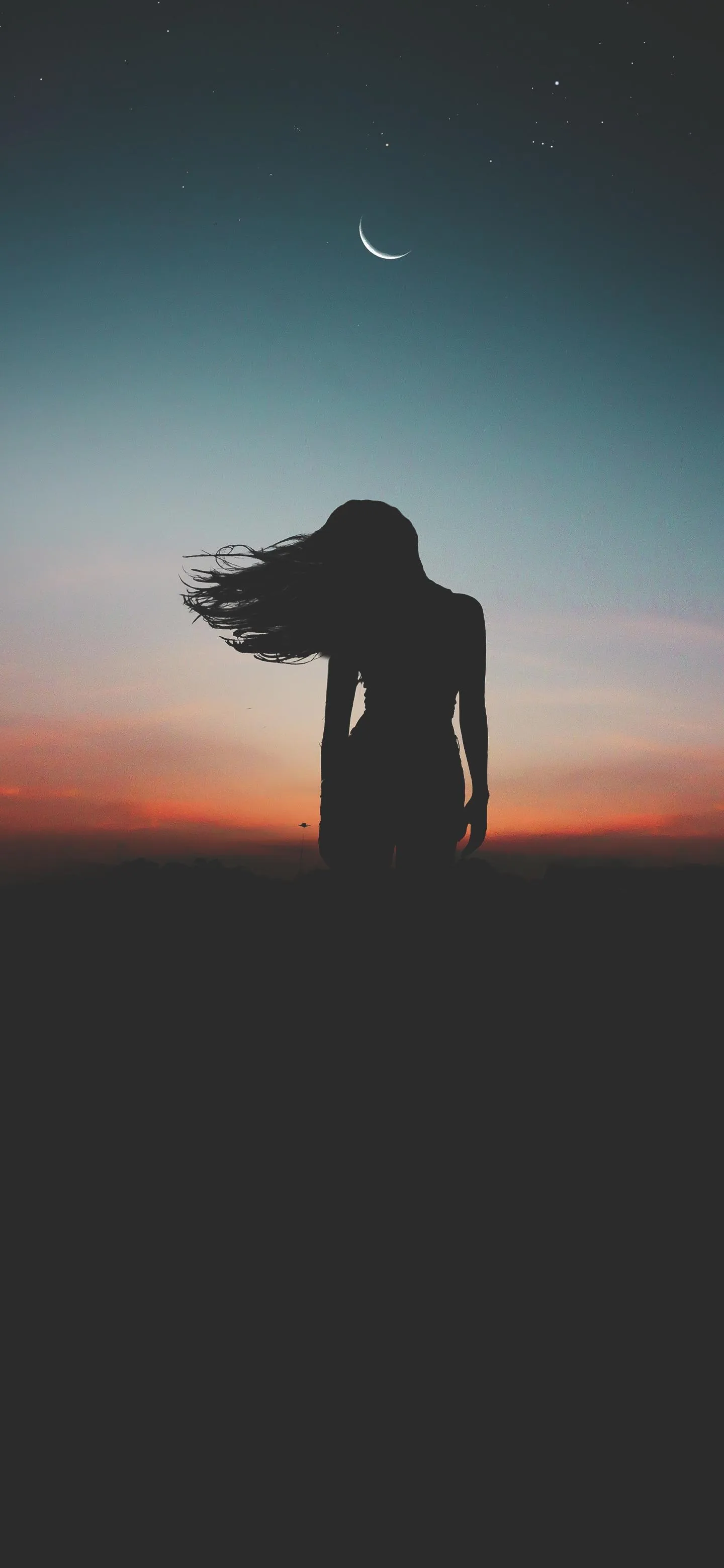 Peaceful Silhouette Pose for Calm Sunset Wallpaper