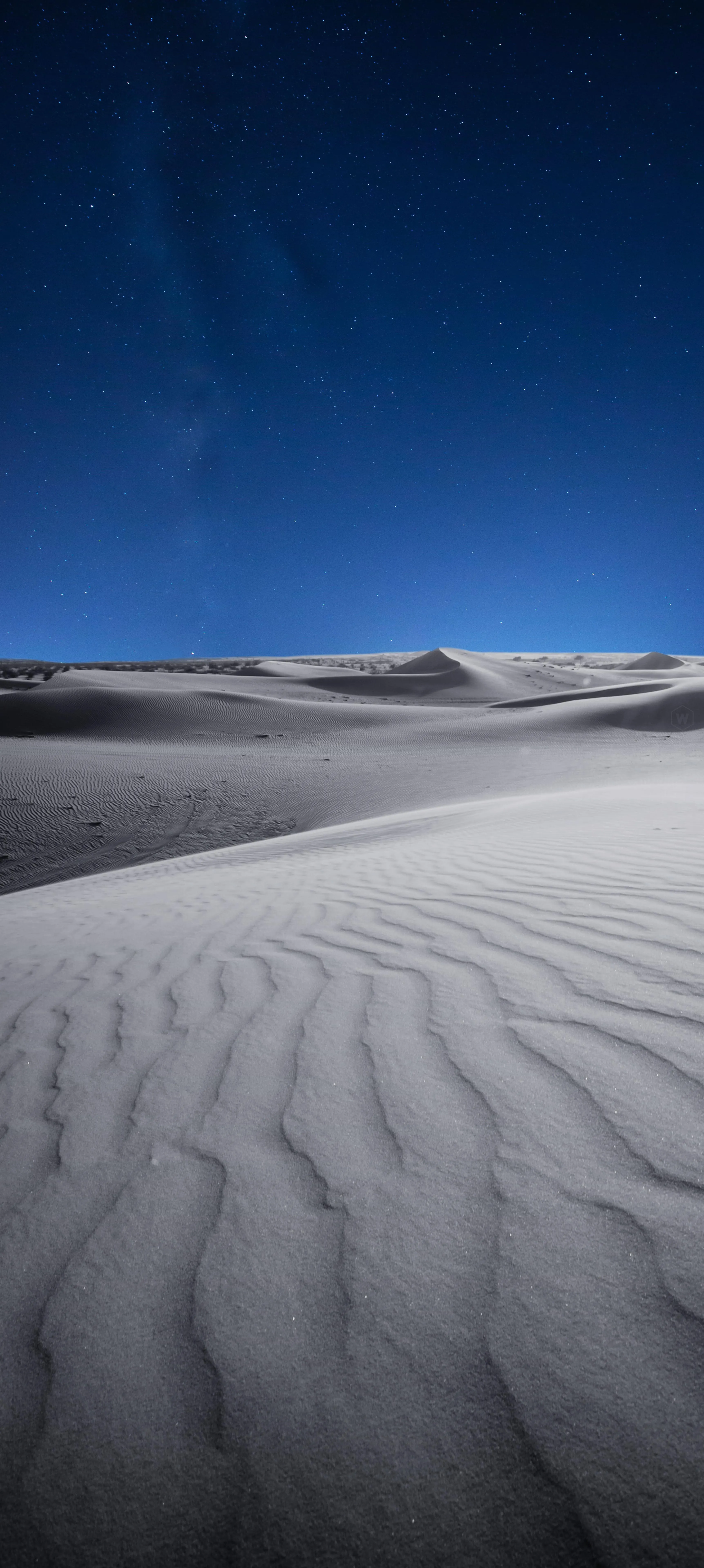 Peaceful White Sand Dunes Under Blue Sky Landscape Image