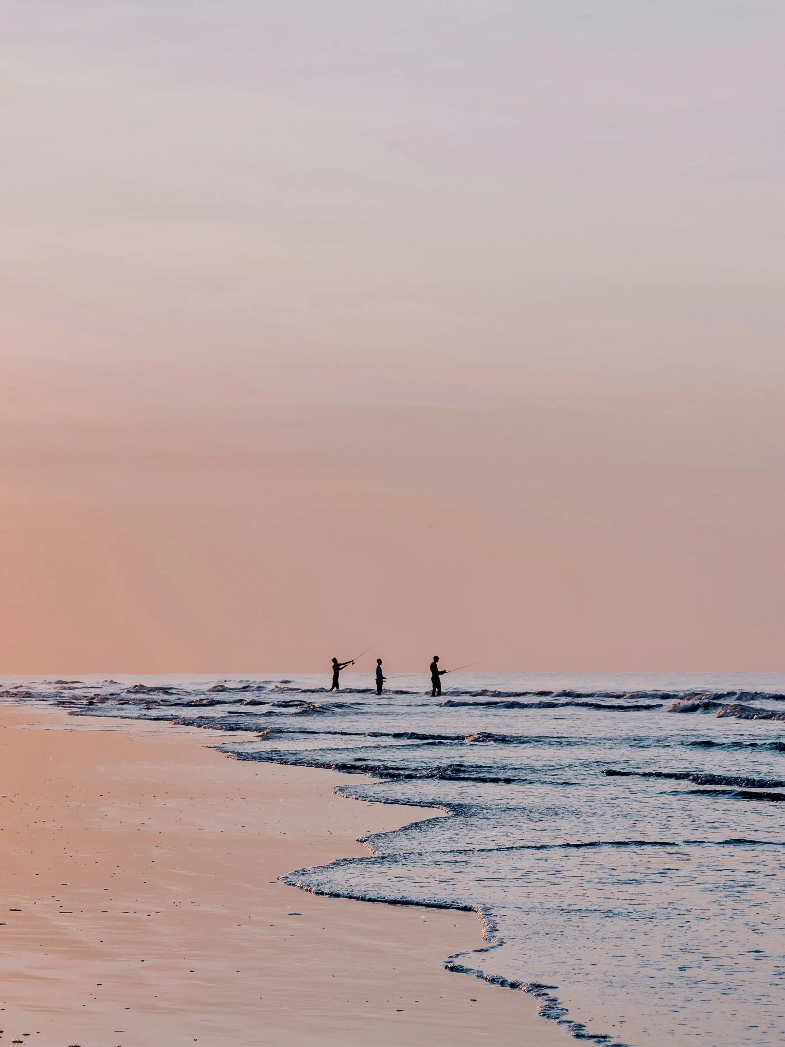 Pink and Blue Sunset Sky Reflected on Beach Sand Wallpaper