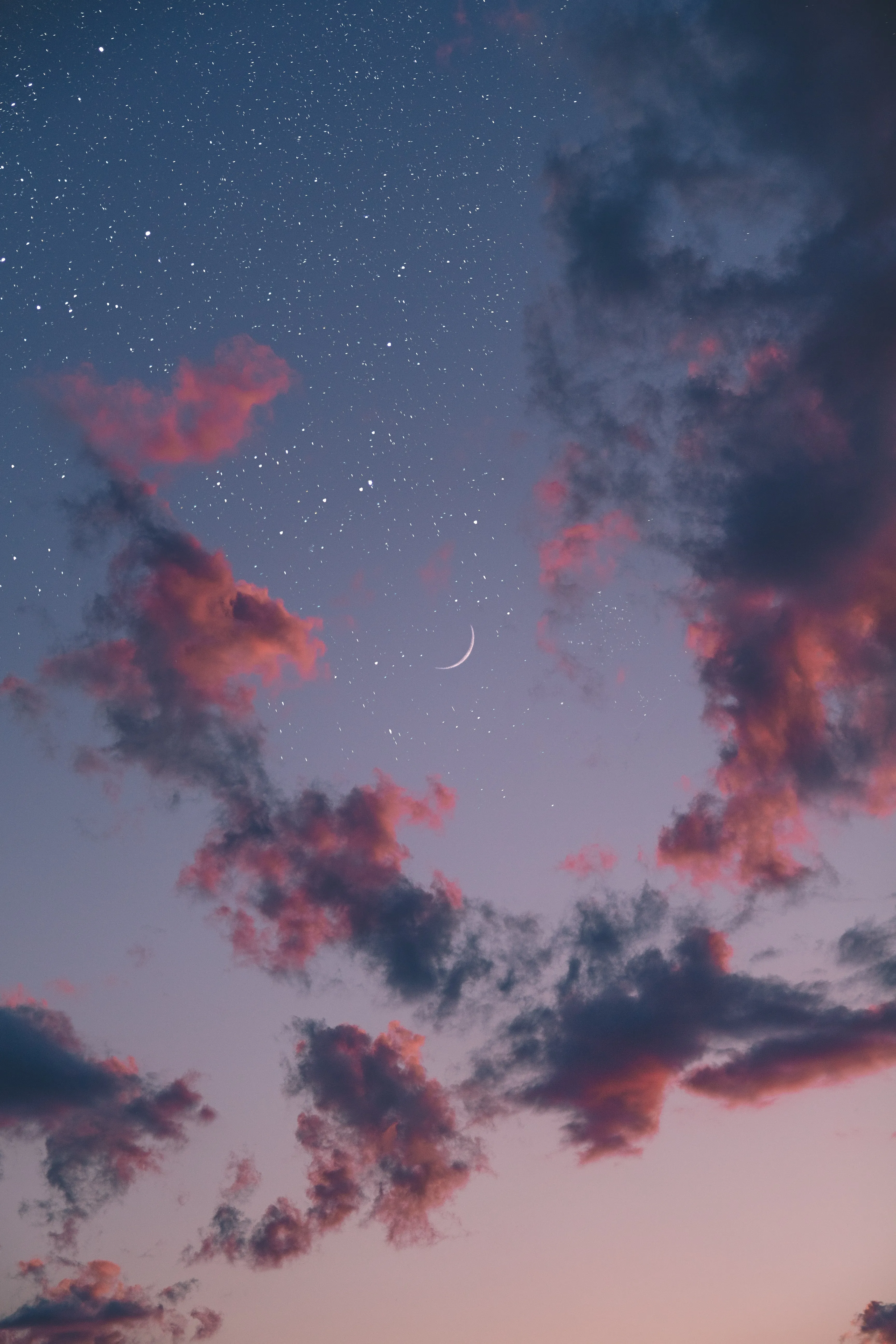 Pink Clouds Floating in Evening Sky Glow Wallpaper
