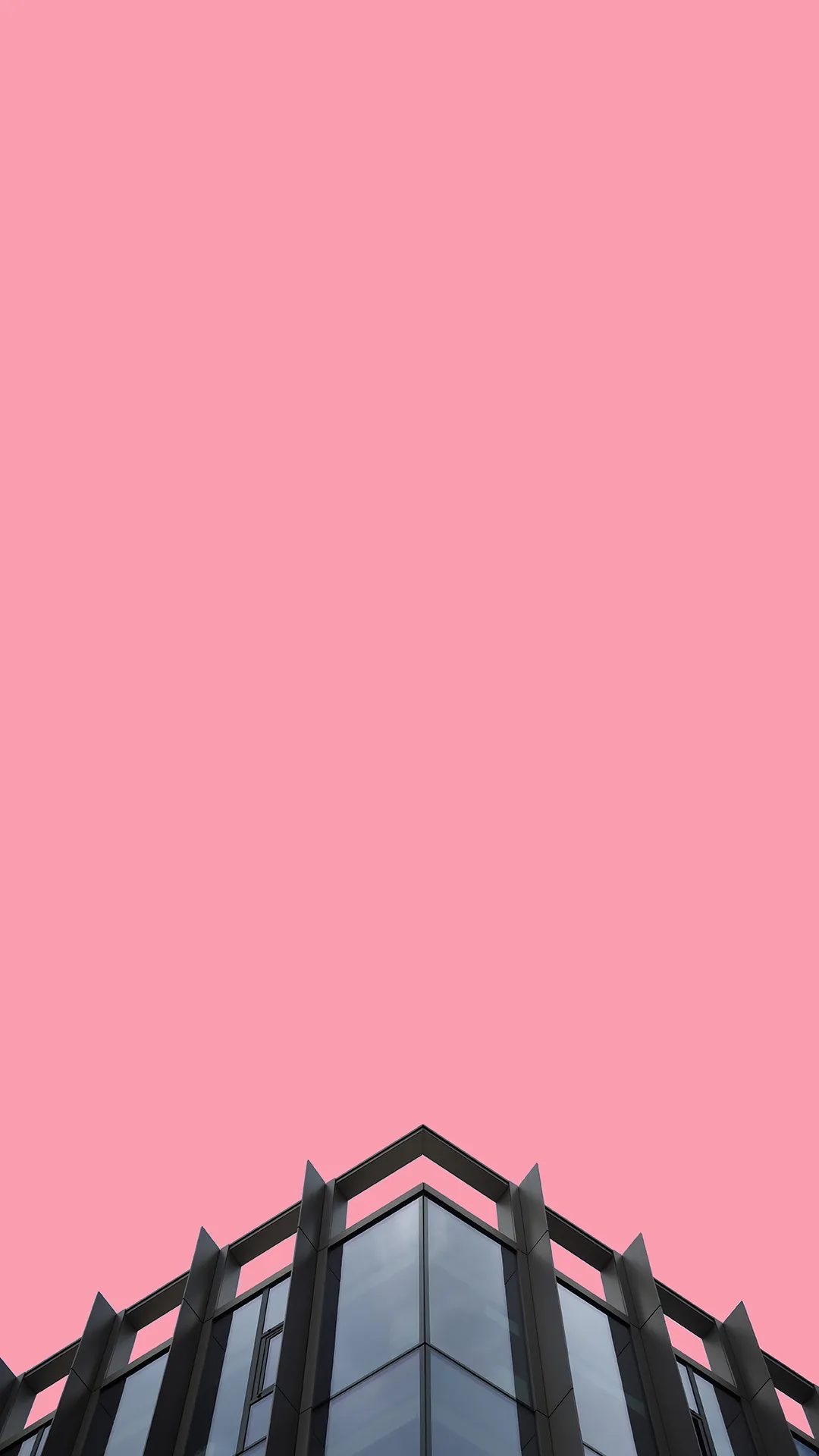 Pink Sky with Black Rooftop in Urban Architecture Wallpaper